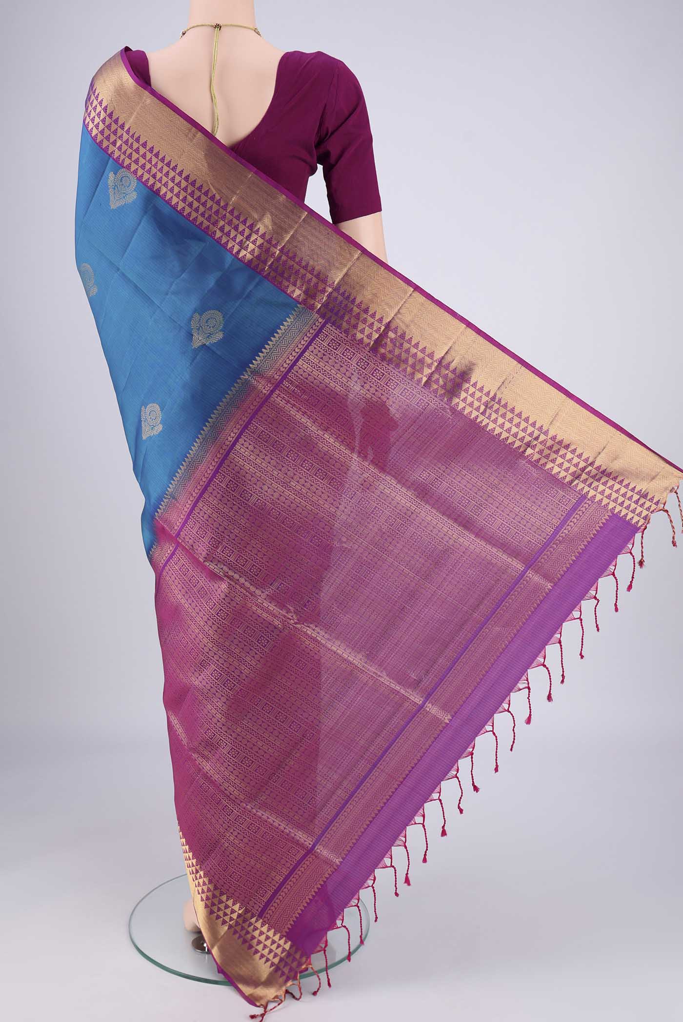 Flat view of Blue Soft Silk Saree with Zari Butta on the body and Zari Border. 