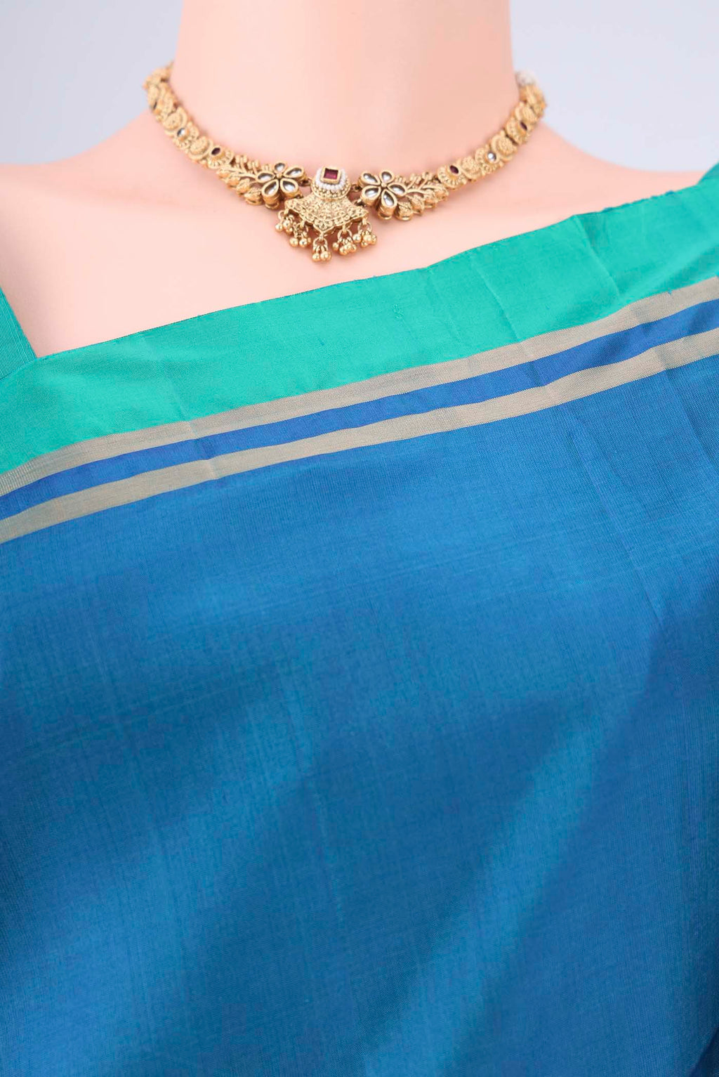 Border image of Blue Soft Silk Saree with Zig Zag design on the body and Zari Border. 