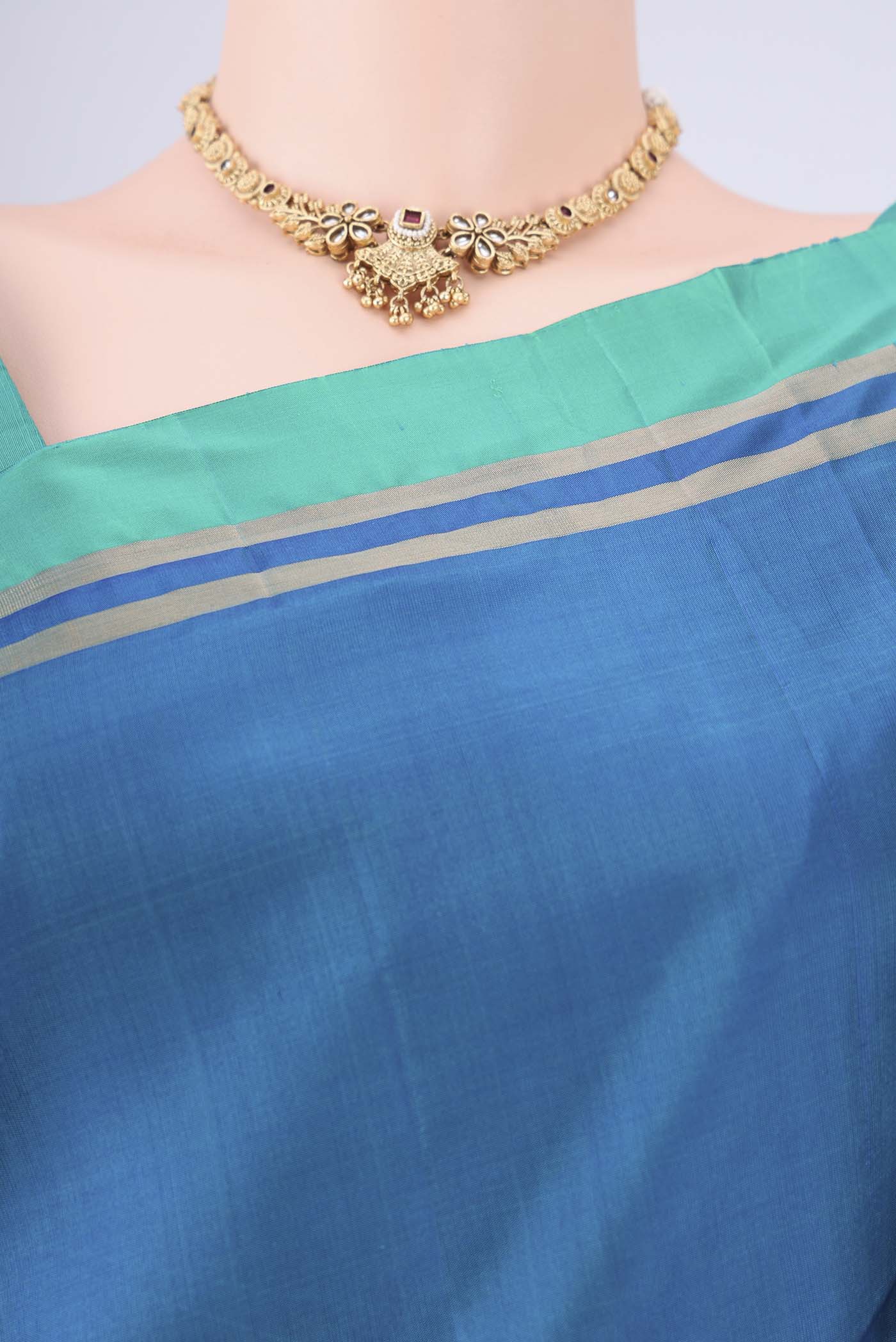 Border image of Blue Soft Silk Saree with Zig Zag design on the body and Zari Border. 