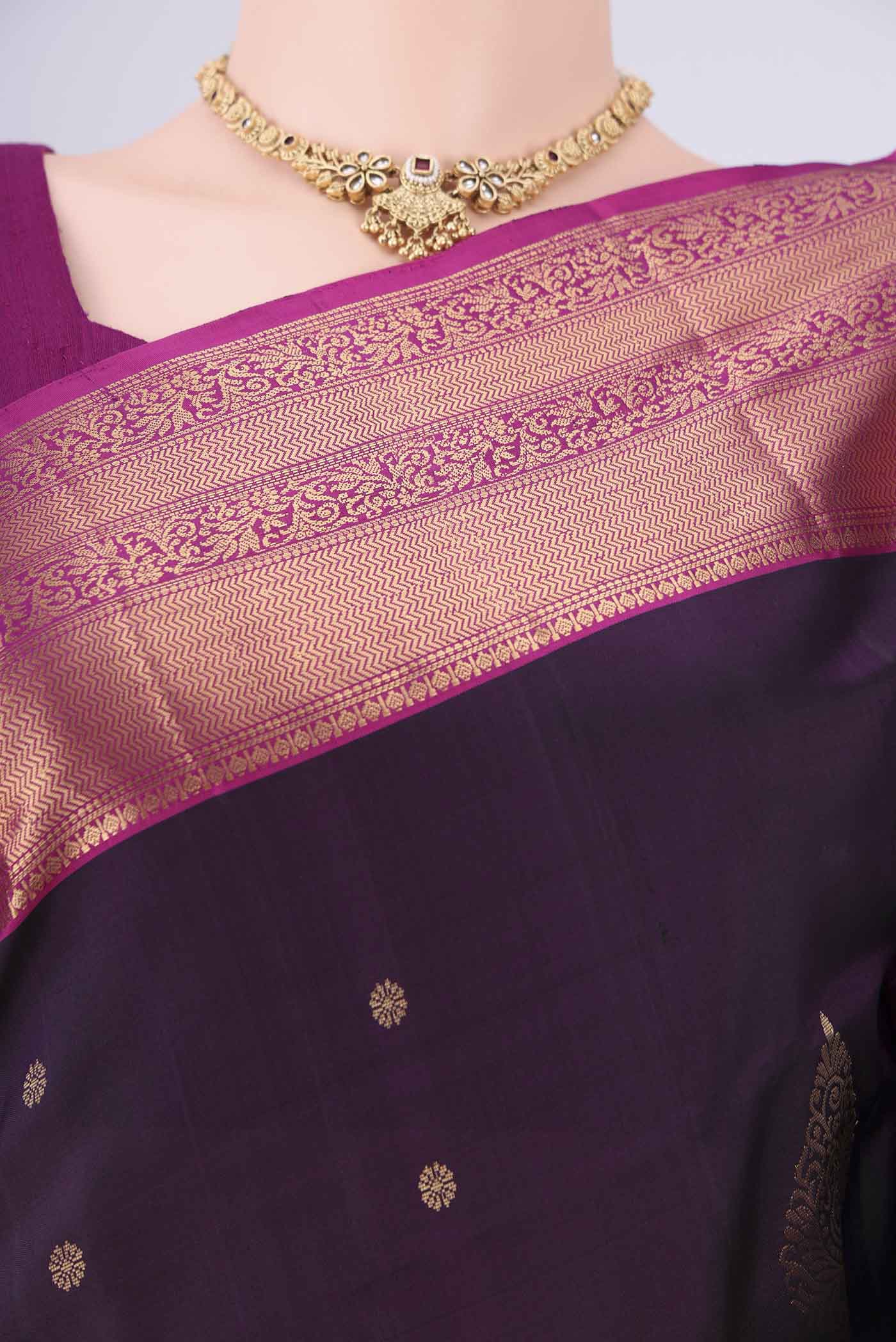 Border image of Purple Soft Silk Saree with Zig Zag design on the body and Zari Border. 