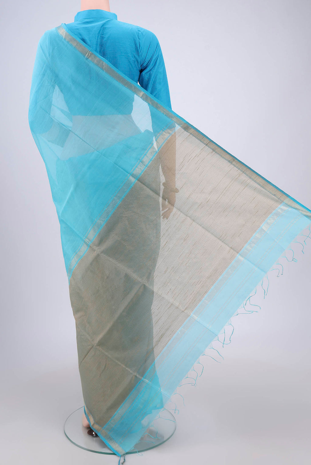 Flat view of Blue Maheshwari Silk Cotton Saree with Plain Body and Zari Border. 