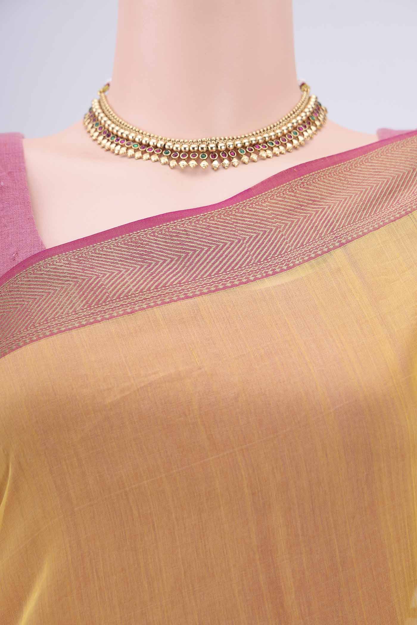 Border image of Mustard Maheshwari Silk Cotton Saree with Plain Body and Zari Border. 