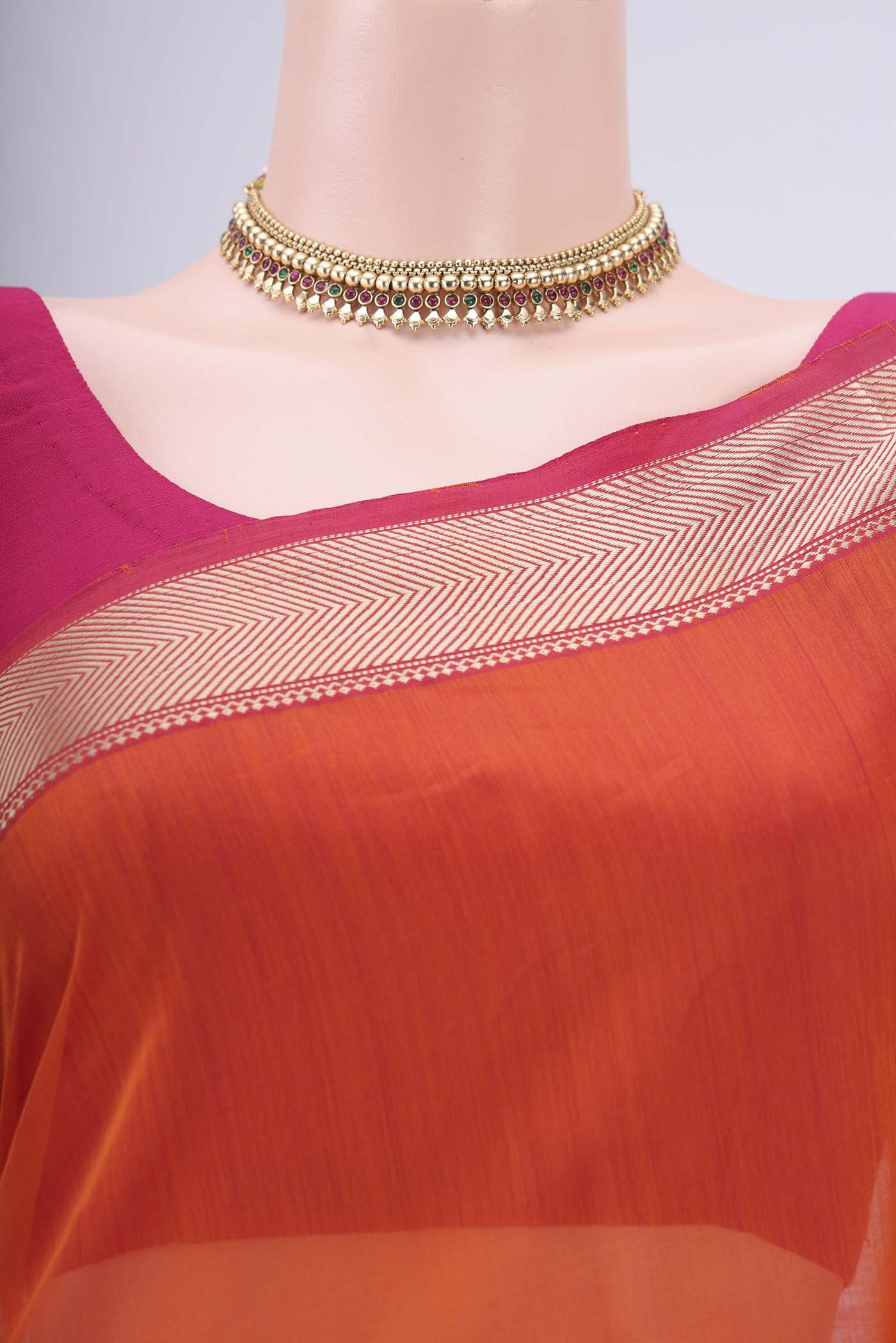 Border image of Orange Maheshwari Silk Cotton Saree with Plain Body and Thread Border. 