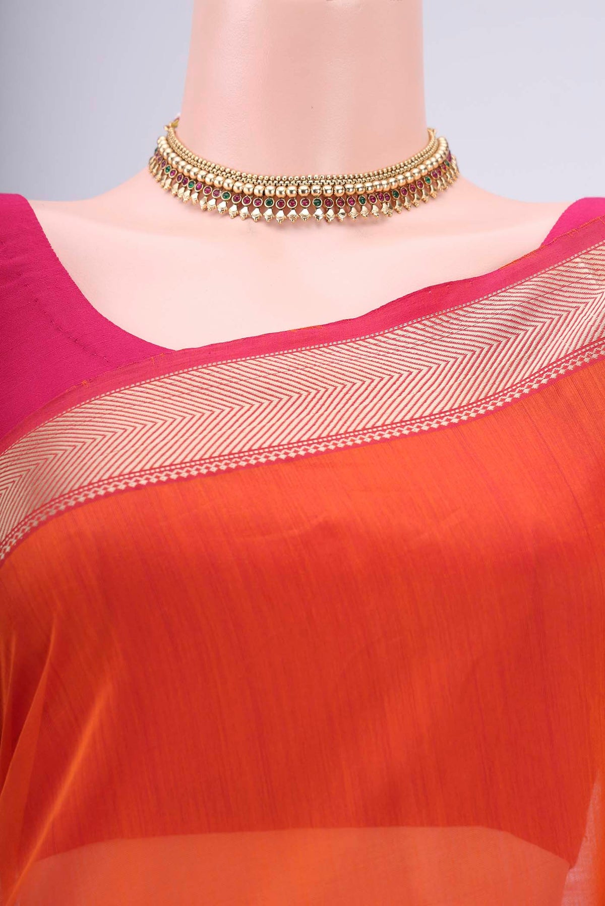 Border image of Orange Maheshwari Silk Cotton Saree with Plain Body and Thread Border. 