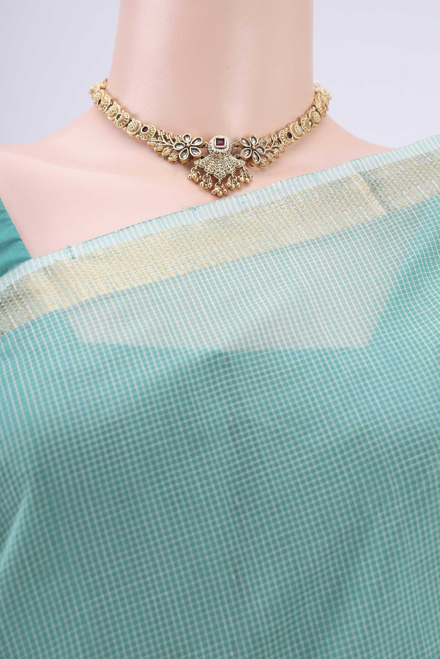 Border image of Sea Green Maheshwari Silk Cotton Saree with Checked design on the body and Zari Border. 