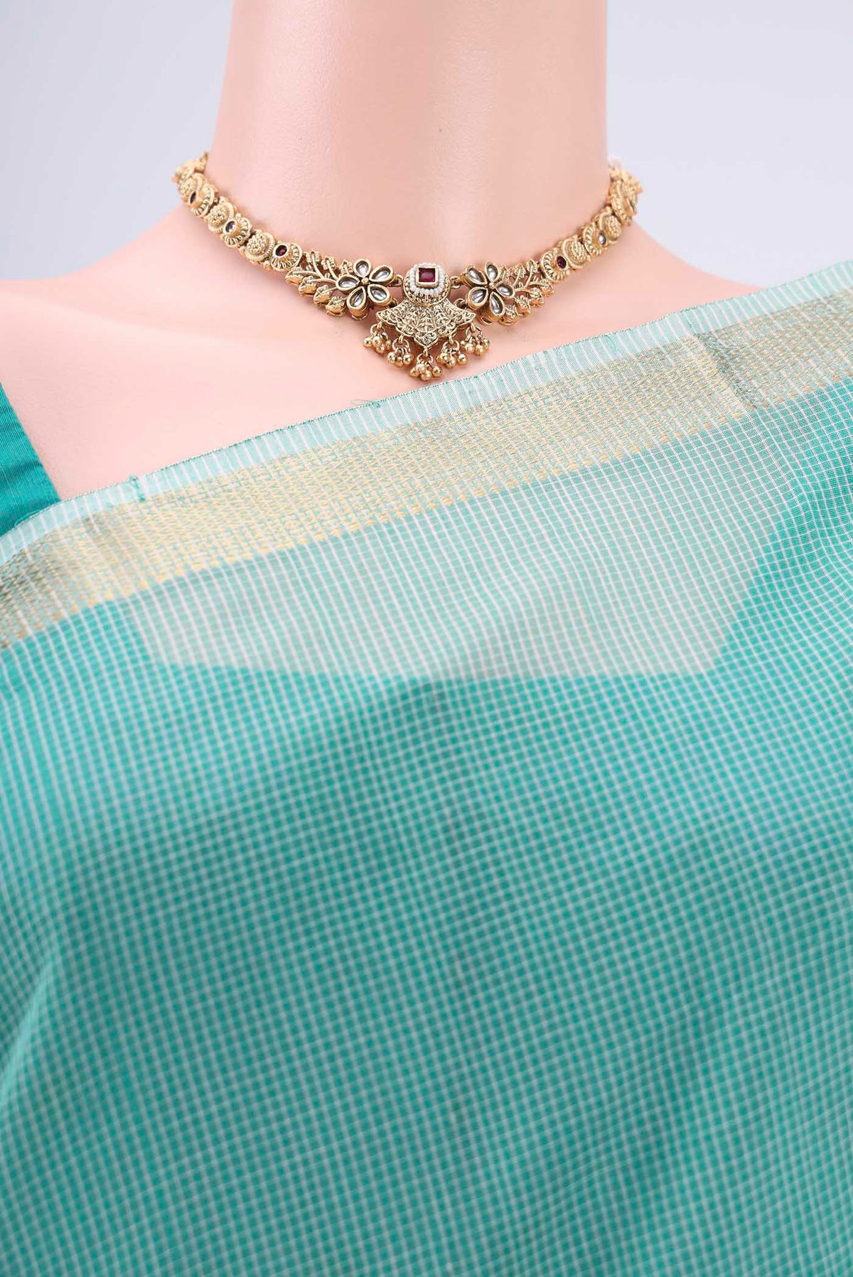 Border image of Sea Green Maheshwari Silk Cotton Saree with Checked design on the body and Zari Border. 