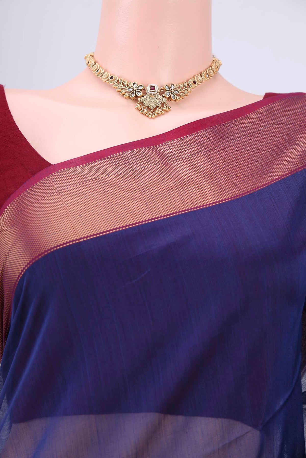 Border image of Purple Maheshwari Silk Cotton Saree with Stripes on the body and Zari Border. 