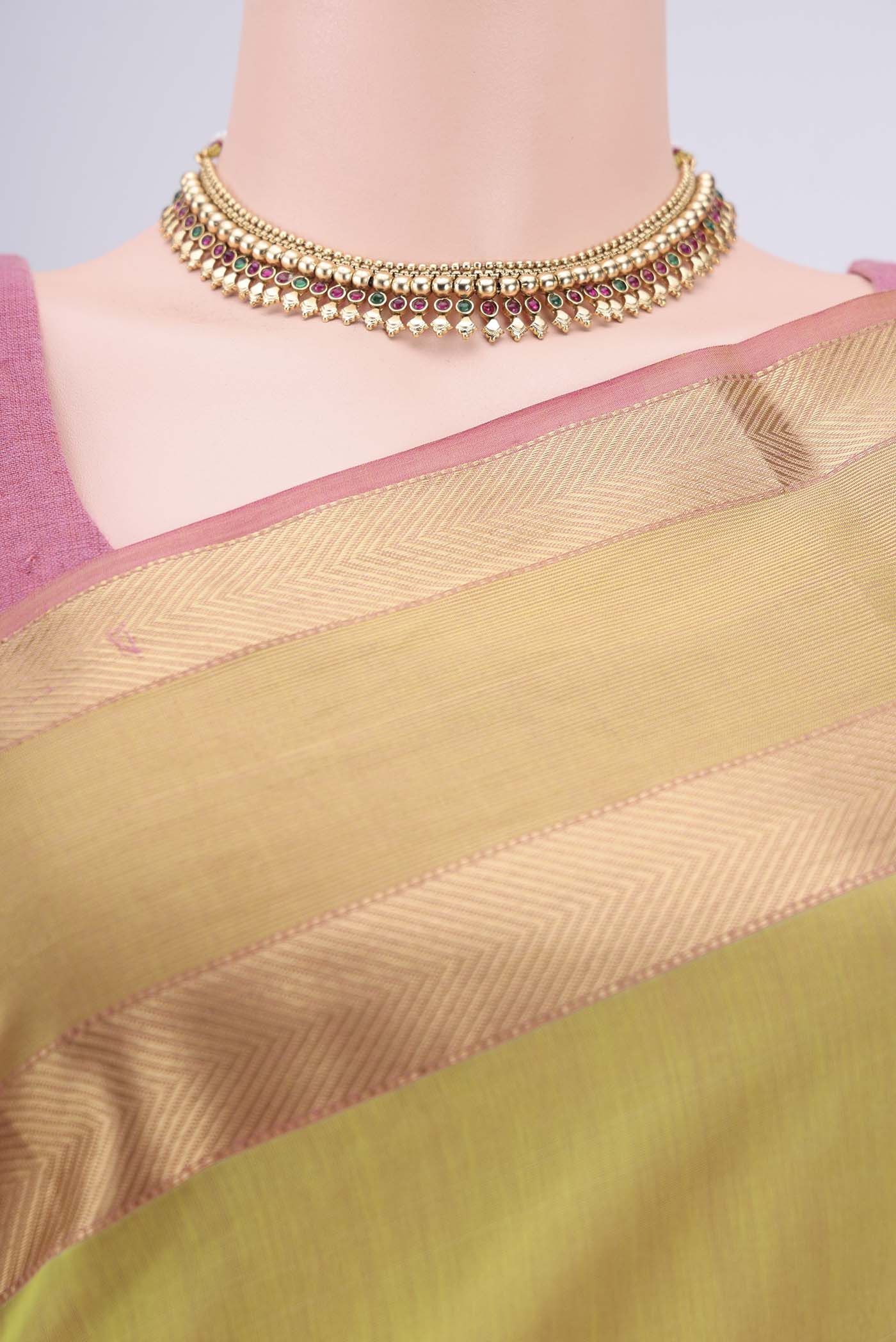 Border image of Parrot Green Maheshwari Silk Cotton Saree with Plain Body and Zari Border. 