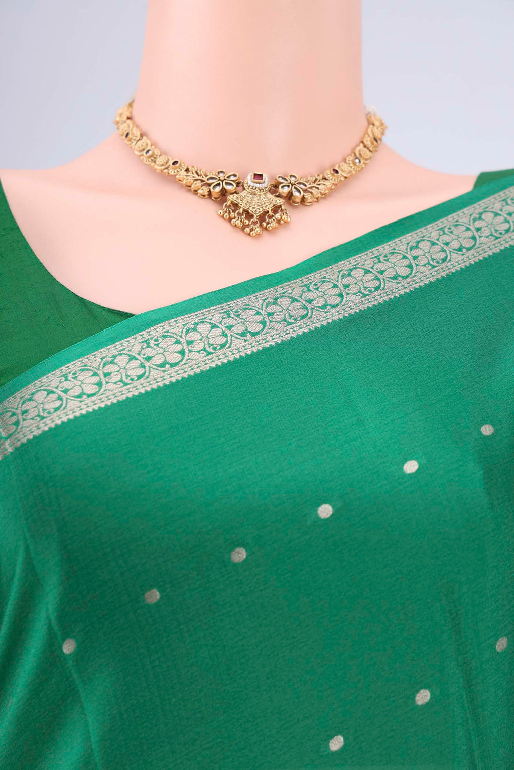 Border image of Green Mysore Crepe Saree with Zari Butta on the body and Zari Border. 