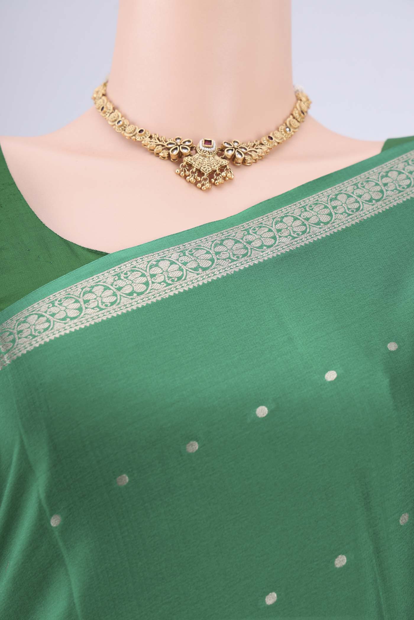 Border image of Green Mysore Crepe Saree with Zari Butta on the body and Zari Border. 
