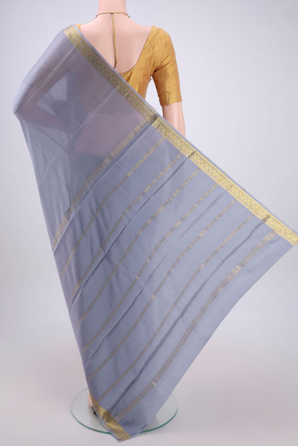 Flat view of Blue Grey Mysore Crepe Saree with Plain Body and Zari Border. 
