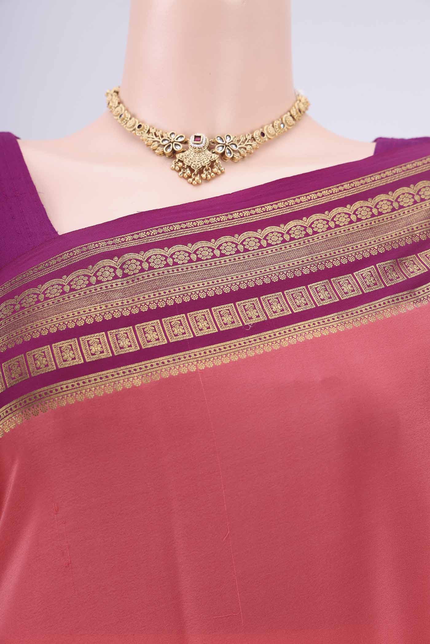 Border image of Peach Mysore Crepe Saree with Plain Body and Zari Border. 