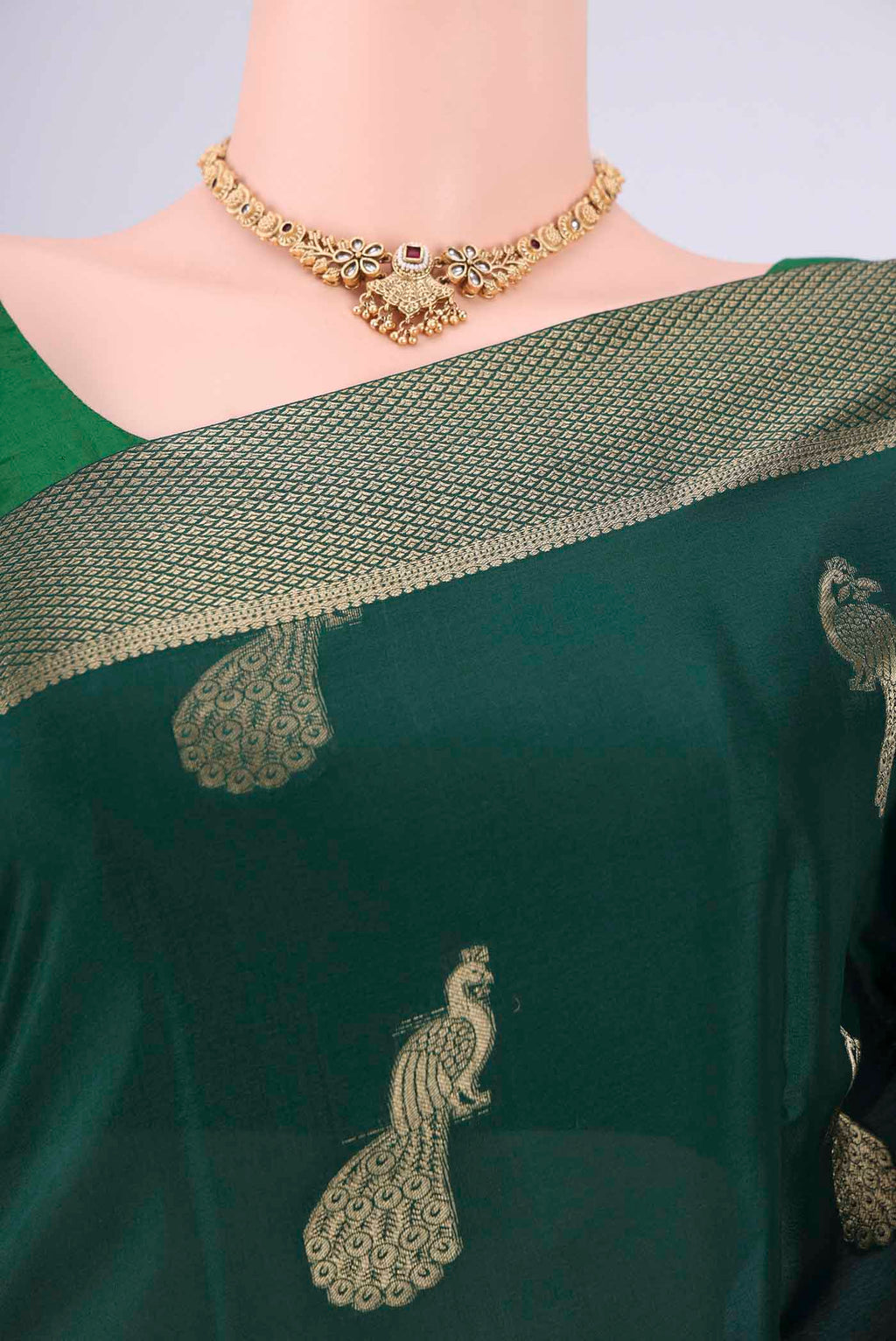 Border image of Bottle Green Mysore Crepe Saree with Plain Body and Zari Border. 