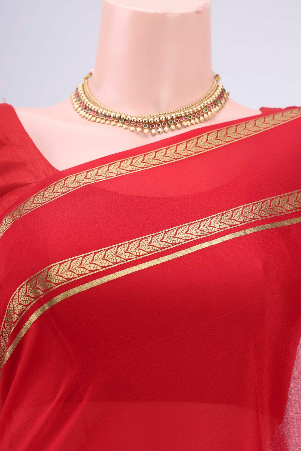 Border image of Red Mysore Crepe Saree with Plain Body and Zari Border. 