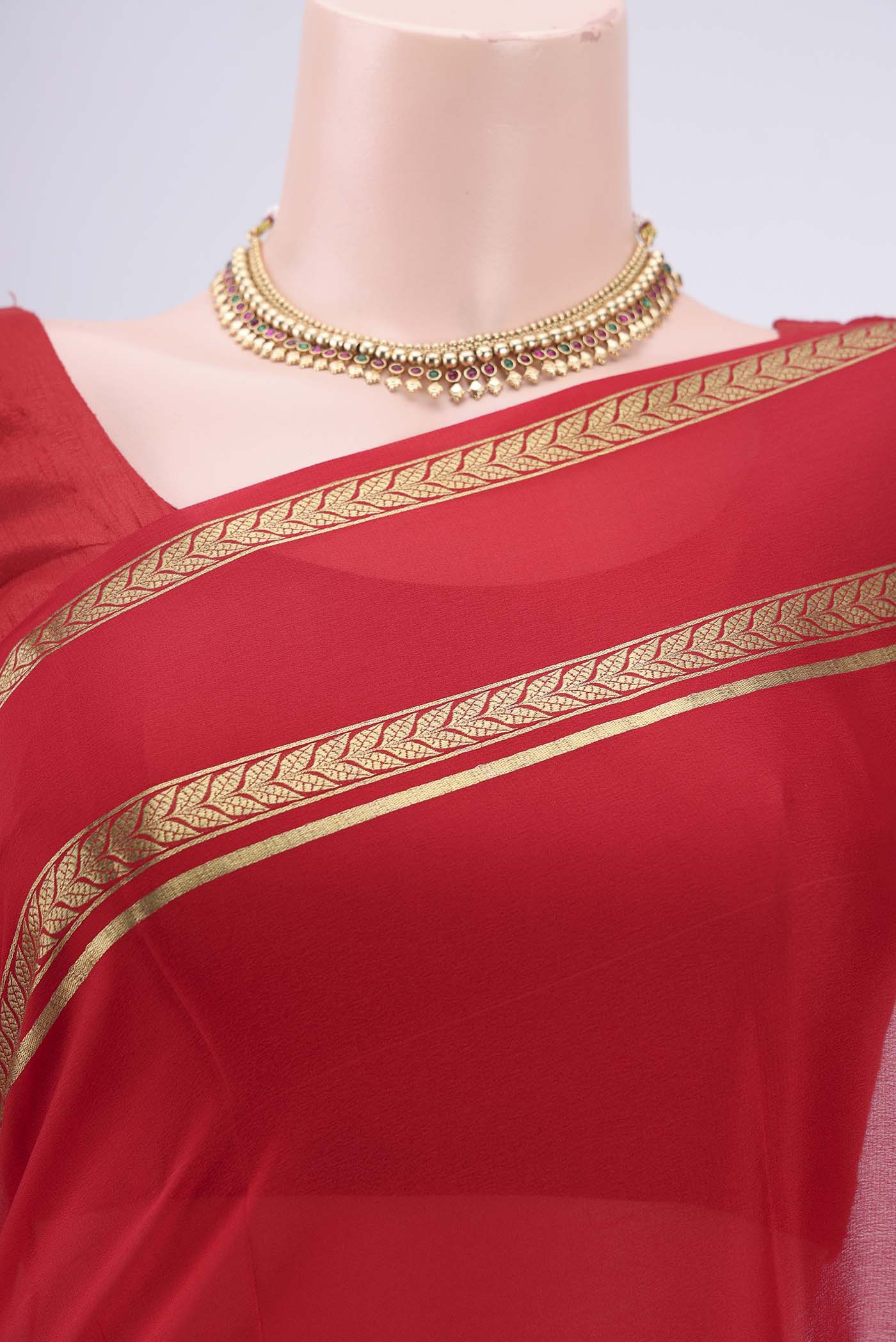 Border image of Red Mysore Crepe Saree with Plain Body and Zari Border. 