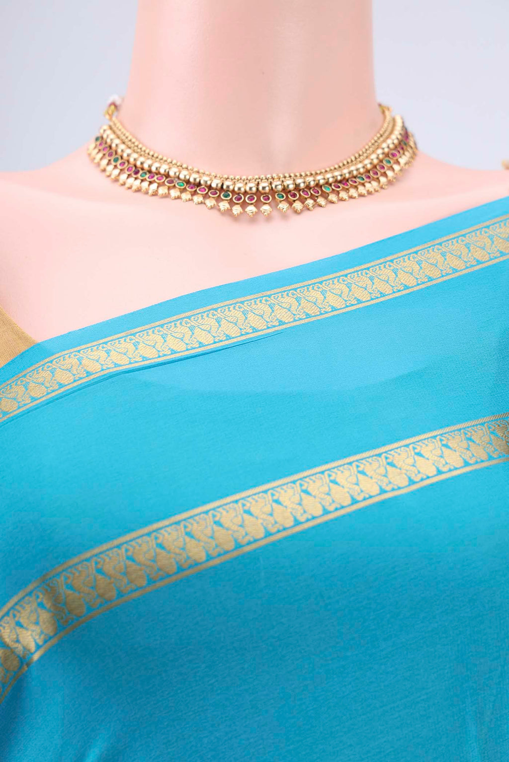 Border image of Blue Mysore Crepe Saree with Plain Body and Zari Border. 