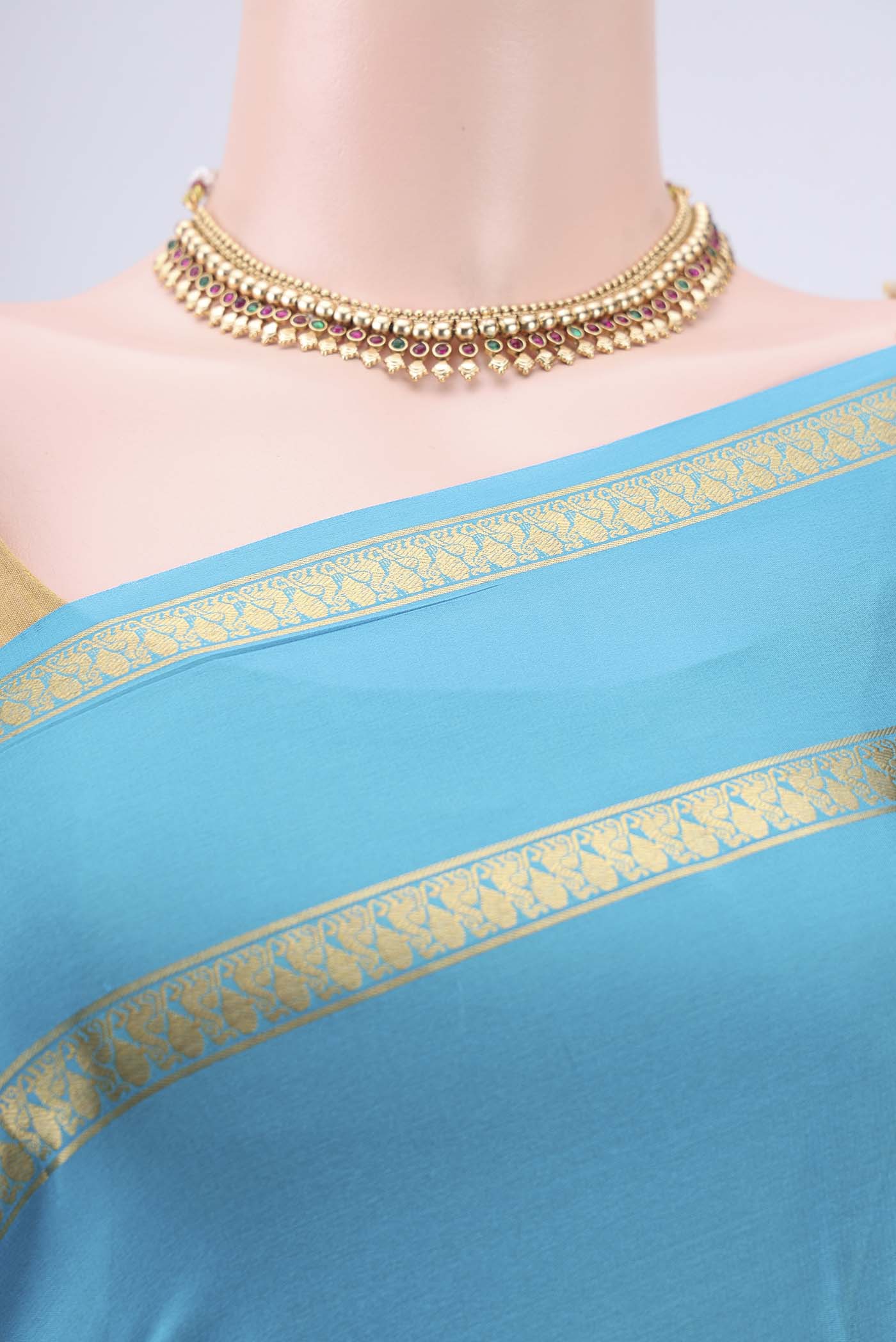 Border image of Blue Mysore Crepe Saree with Plain Body and Zari Border. 