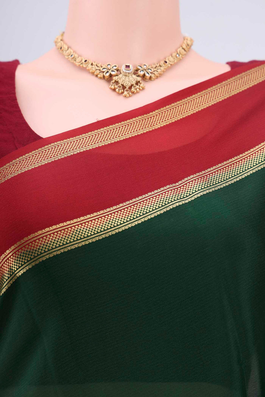 Border image of Bottle Green Mysore Crepe Saree with Plain Body and Zari Border. 