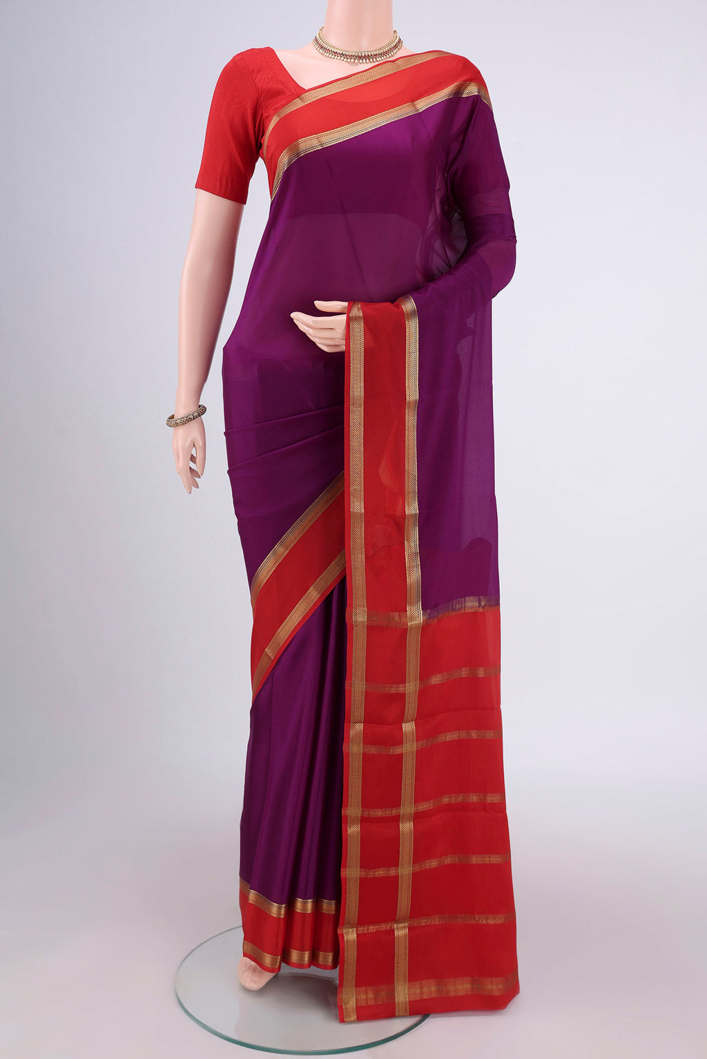 Purple Mysore Crepe Saree with Plain Body and Zari Border.  displayed on a mannequin