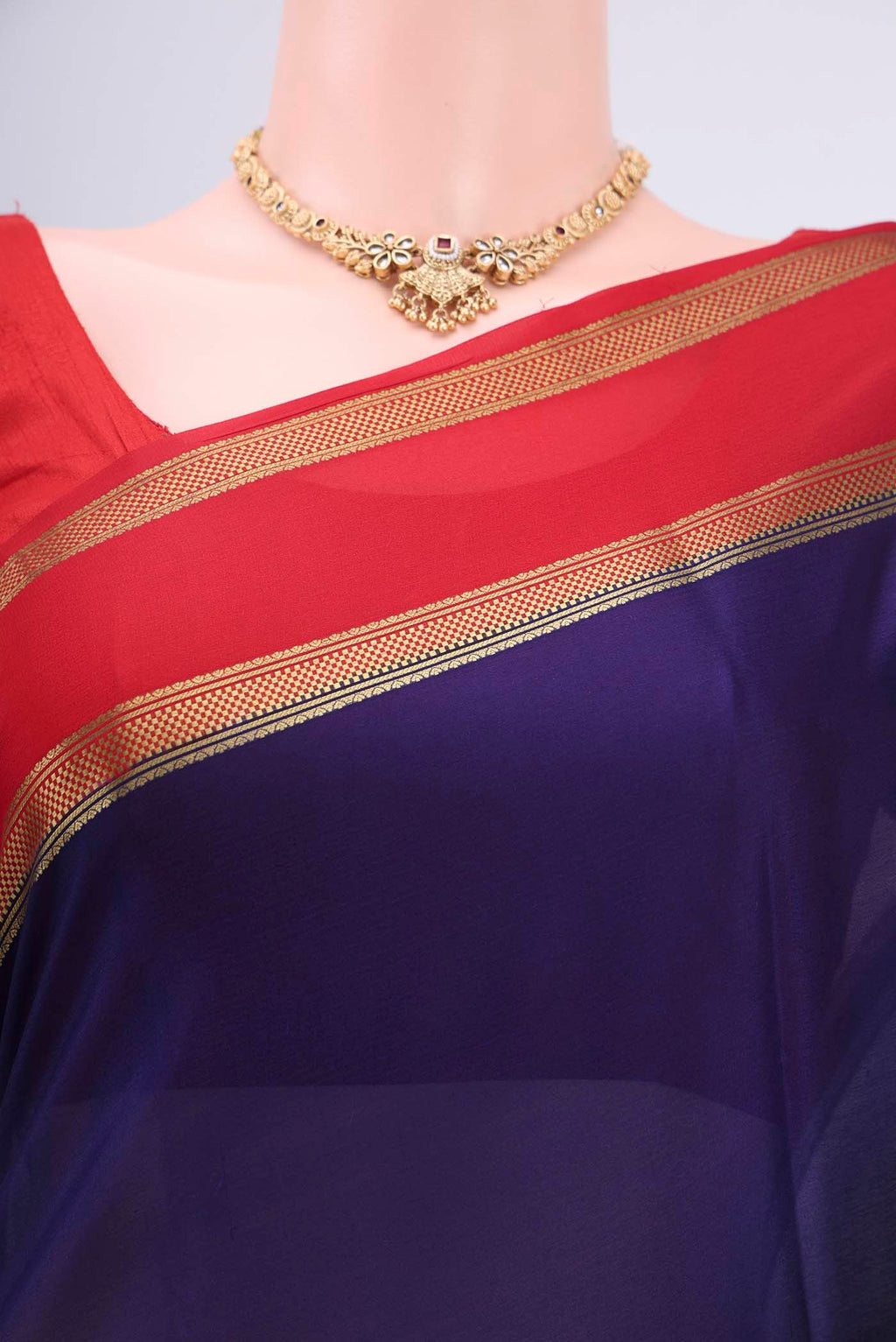 Border image of Navy Blue Mysore Crepe Saree with Plain Body and Zari Border. 