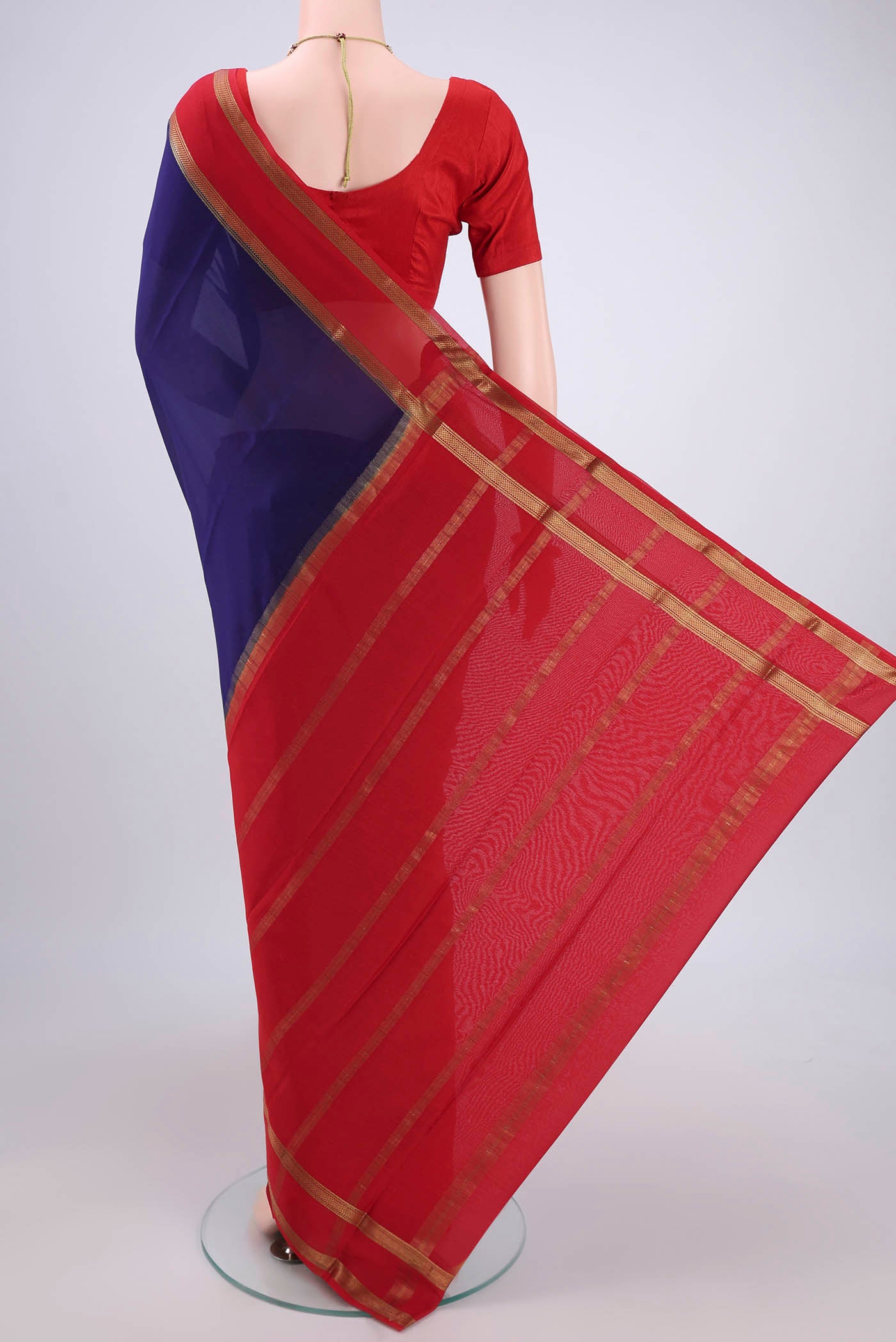 Flat view of Navy Blue Mysore Crepe Saree with Plain Body and Zari Border. 