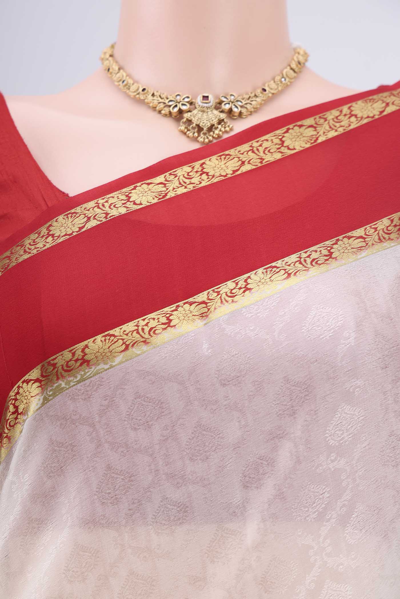Border image of Off White Mysore Crepe Saree with Jacquard design on the body and Zari Border. 