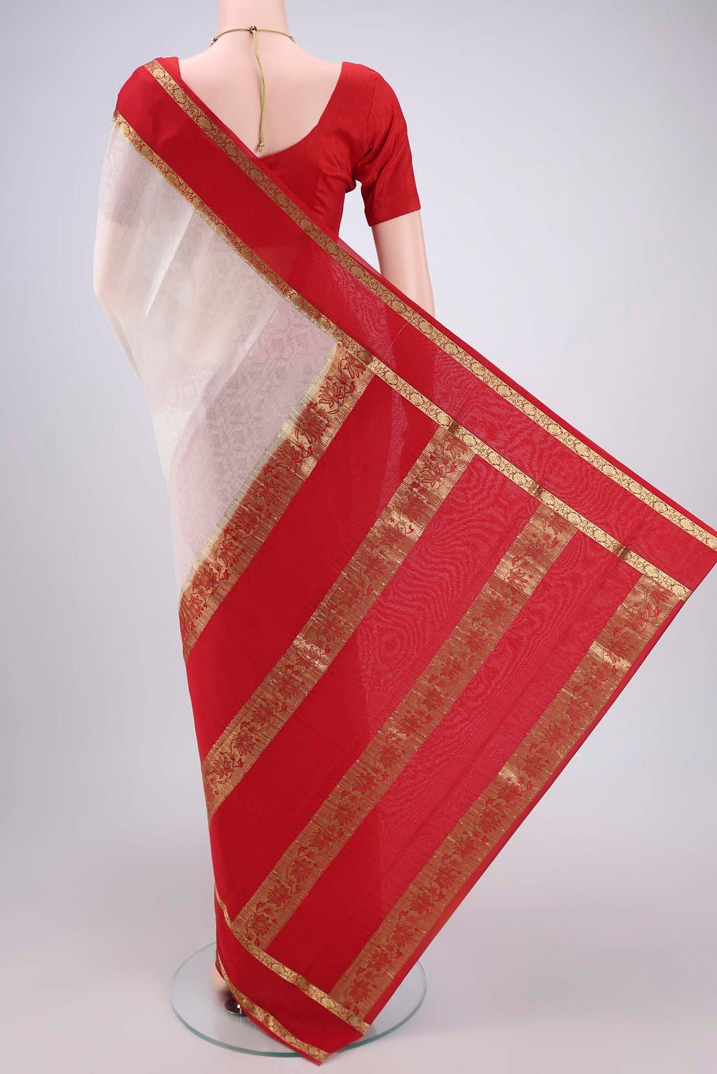 Flat view of Off White Mysore Crepe Saree with Jacquard design on the body and Zari Border. 