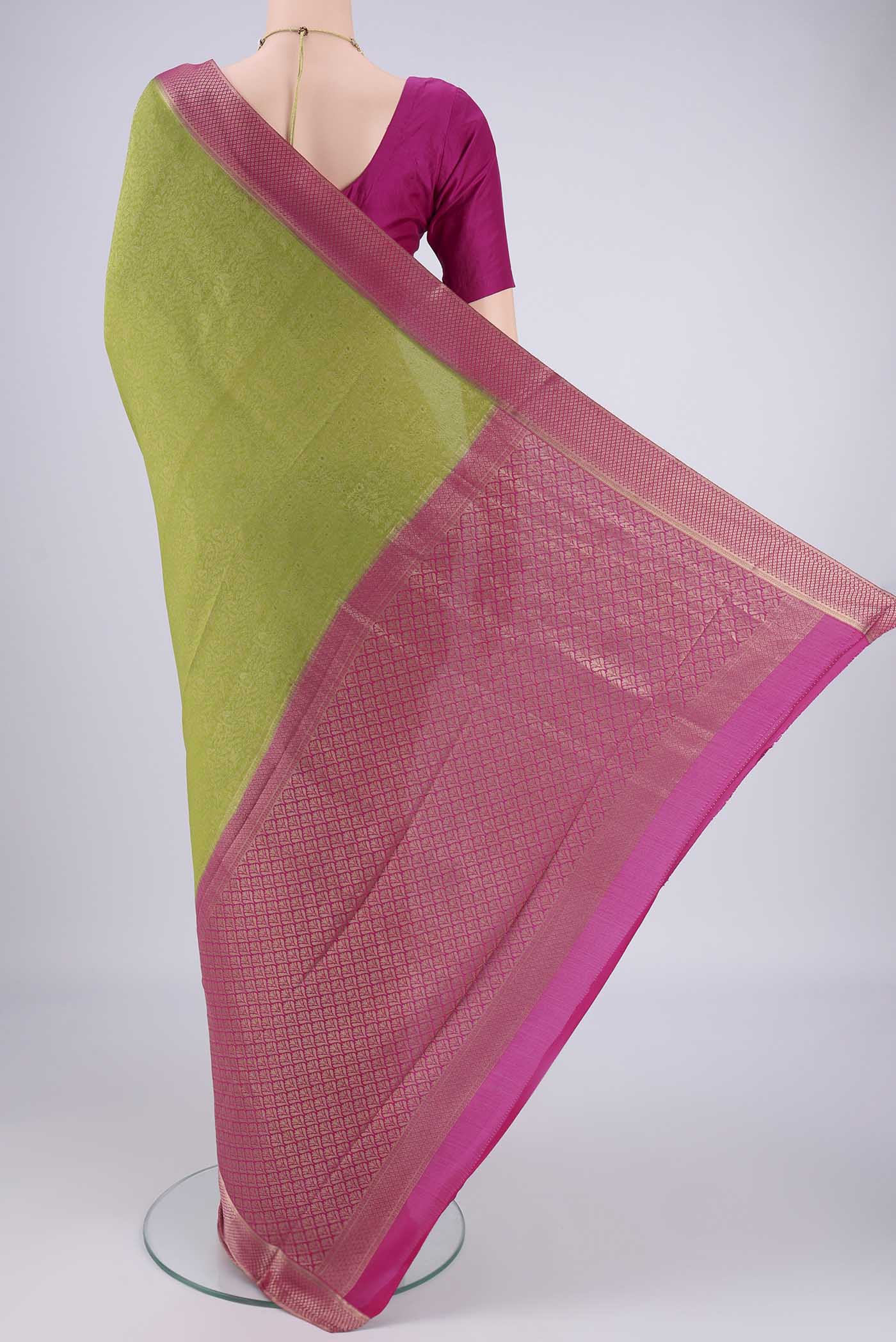 Flat view of Green Mysore Crepe Saree with Zari Brocade on the body and Zari Border. 