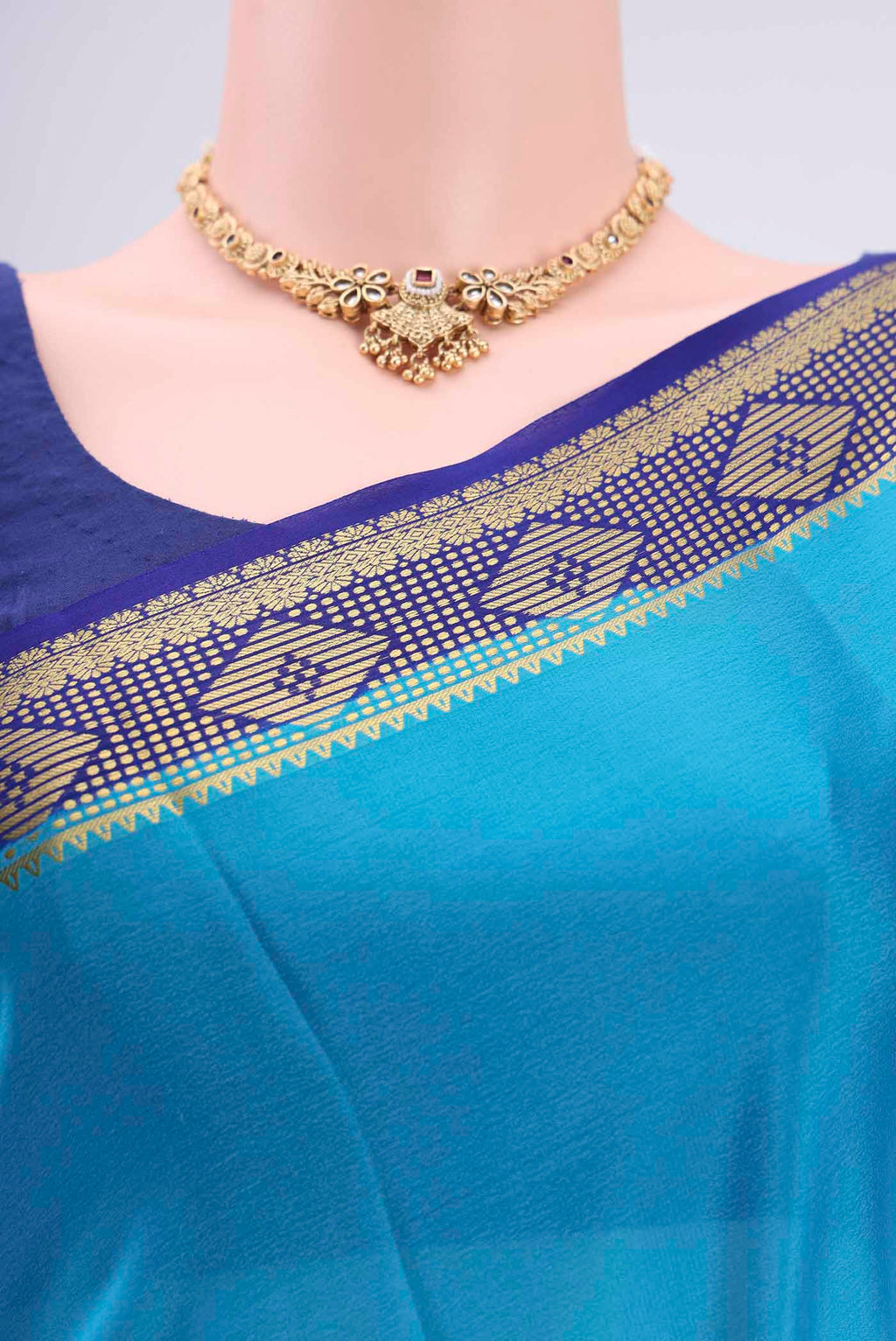 Border image of Electric Blue Mysore Crepe Saree with Plain Body and Zari Border. 