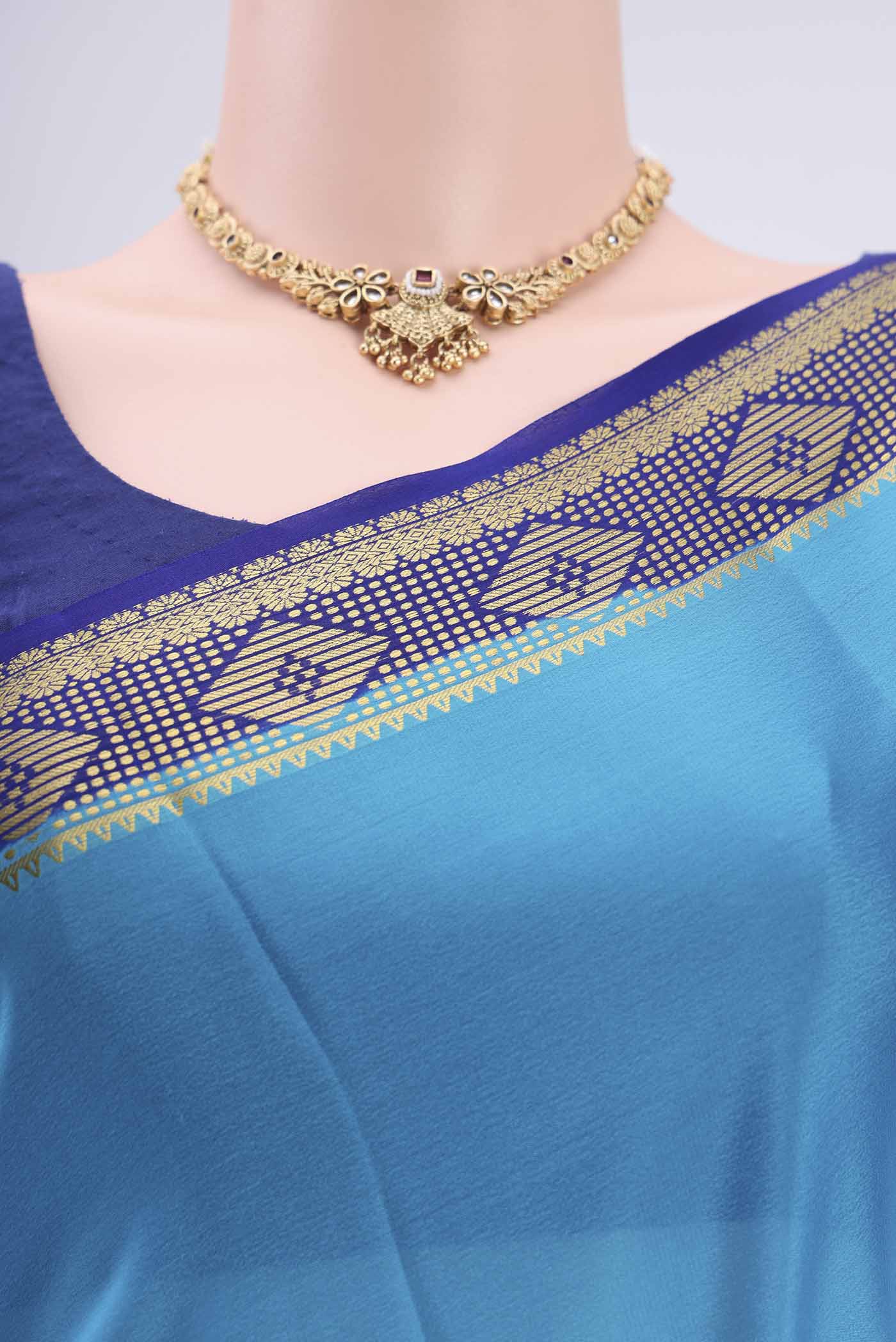 Border image of Electric Blue Mysore Crepe Saree with Plain Body and Zari Border. 
