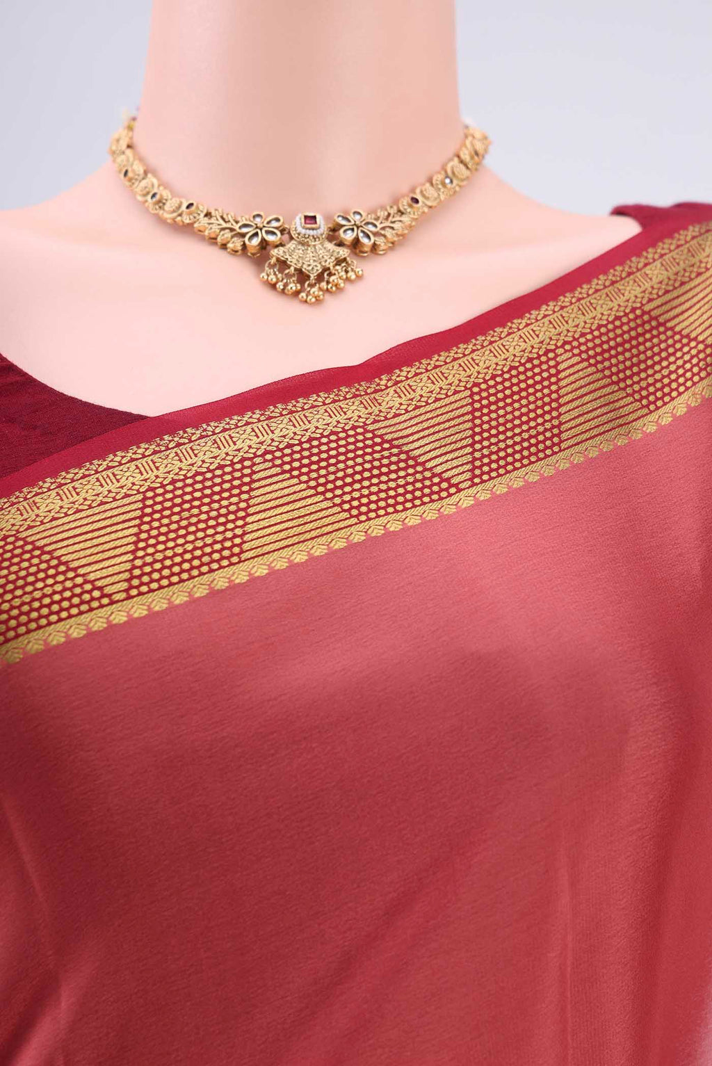 Border image of Coral Mysore Crepe Saree with Plain Body and Zari Border. 