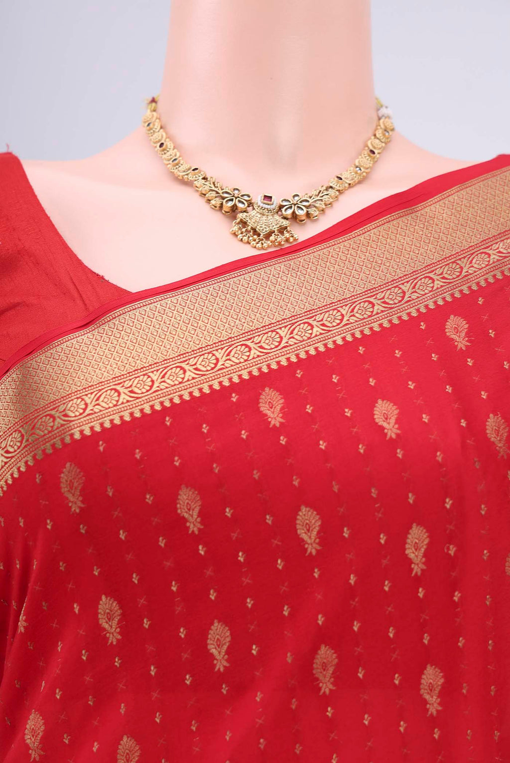 Border image of Red Mysore Crepe Saree with Zari Butta on the body and Zari Border. 