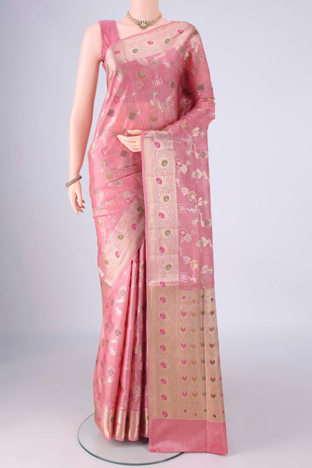 Rose pink Banarasi Tussar Silk Saree with Zari And Thread Butta on the body and Zari Border.  displayed on a mannequin