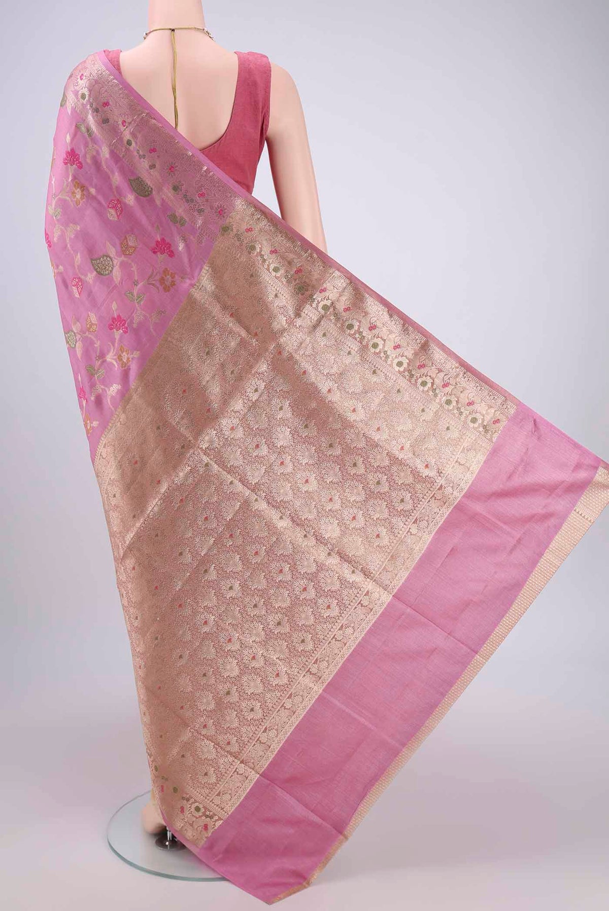 Flat view of Rose pink Banarasi Tussar Silk Saree with Zari Brocade on the body and Zari And Thread Border. 