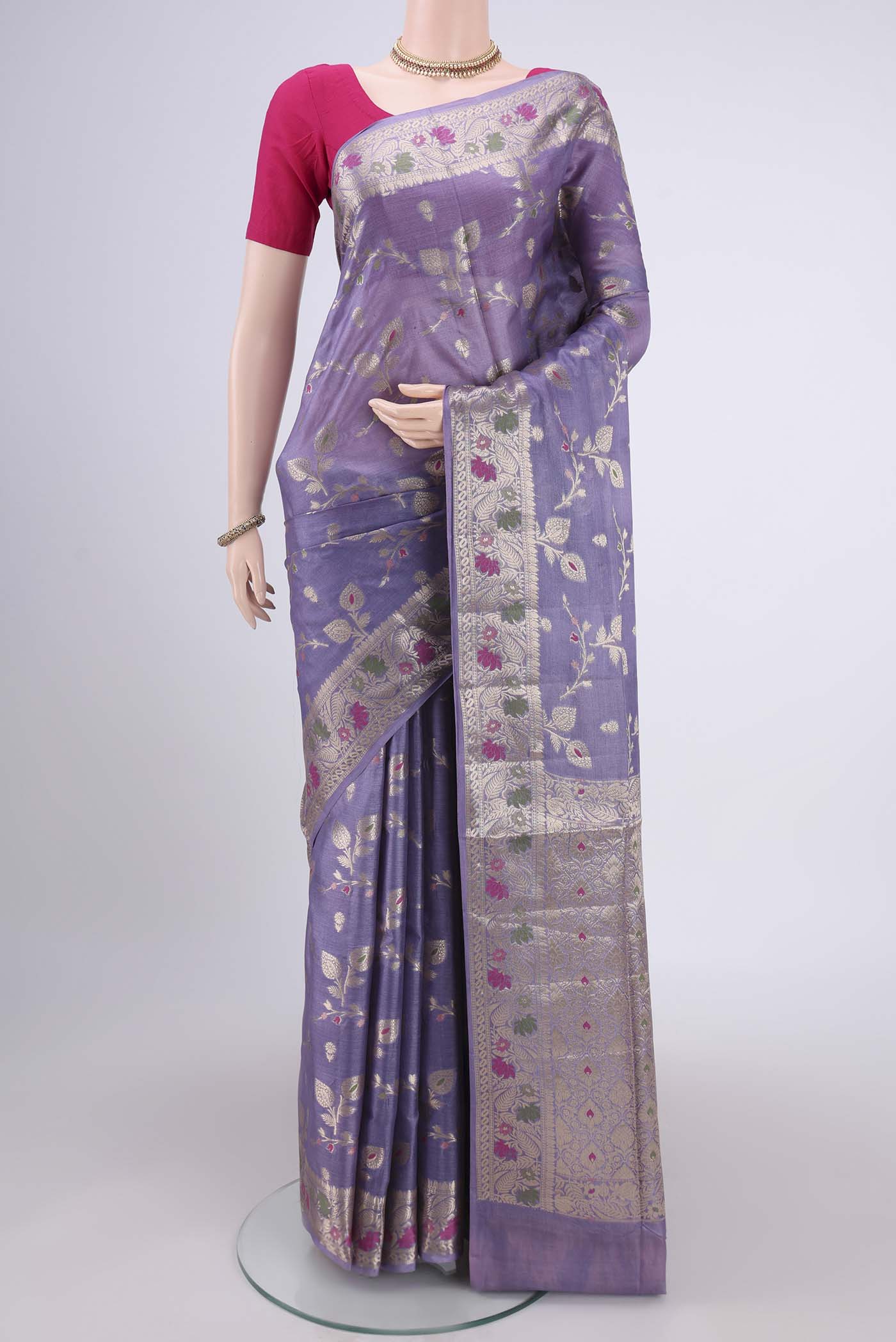 Lavender Banarasi Tussar Silk Saree with Zari Brocade on the body and Zari And Thread Border.  displayed on a mannequin