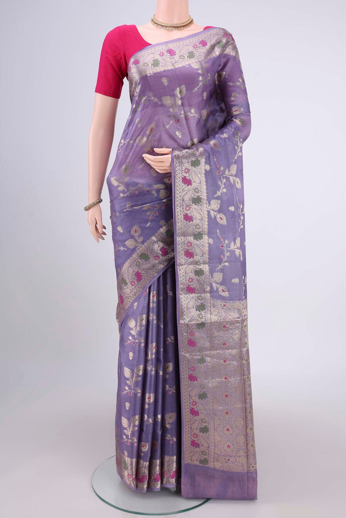 Lavender Banarasi Tussar Silk Saree with Zari Brocade on the body and Zari And Thread Border.  displayed on a mannequin