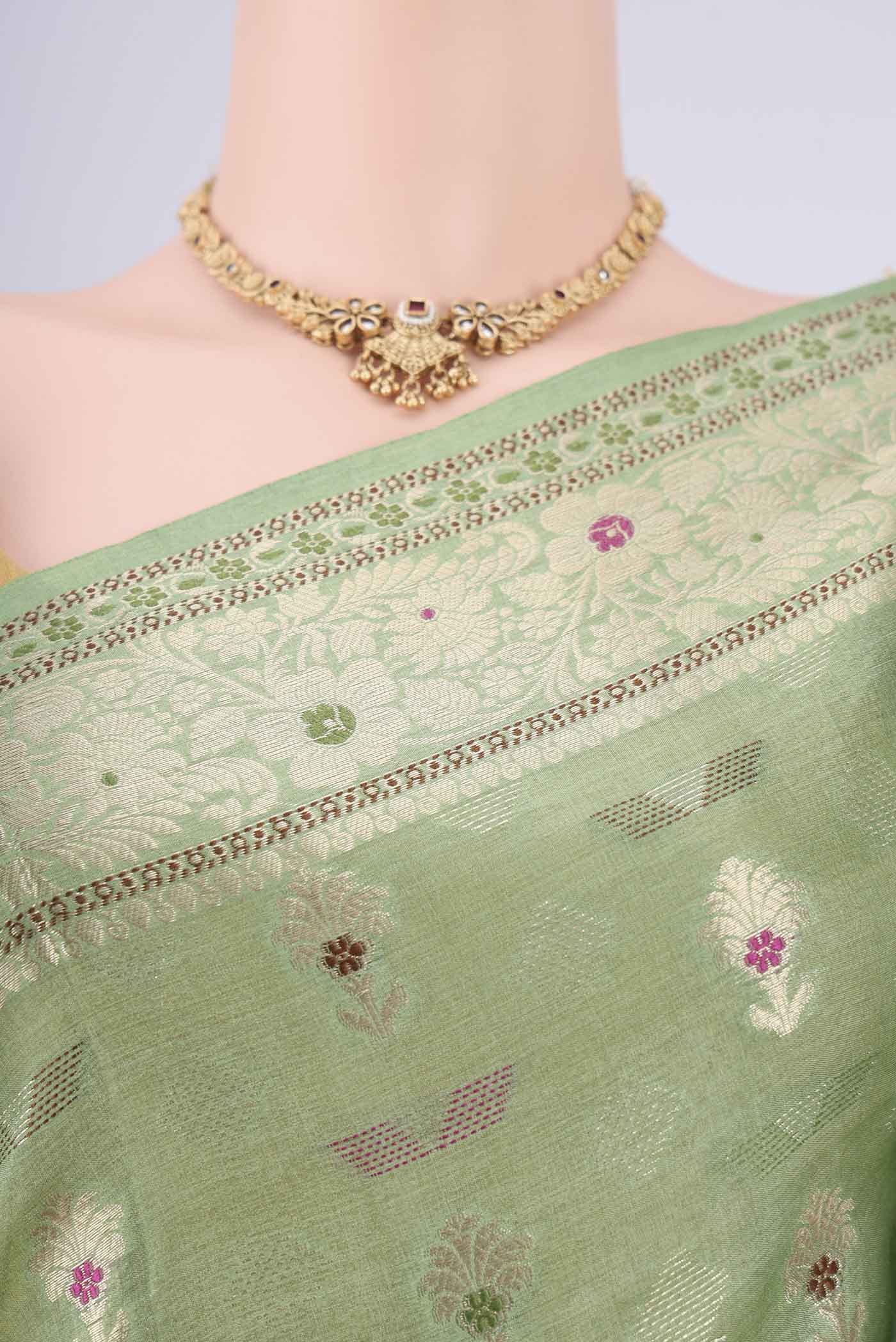 Border image of Light Green Banarasi Tussar Silk Saree with Zari And Thread Butta on the body and Zari And Thread Border. 