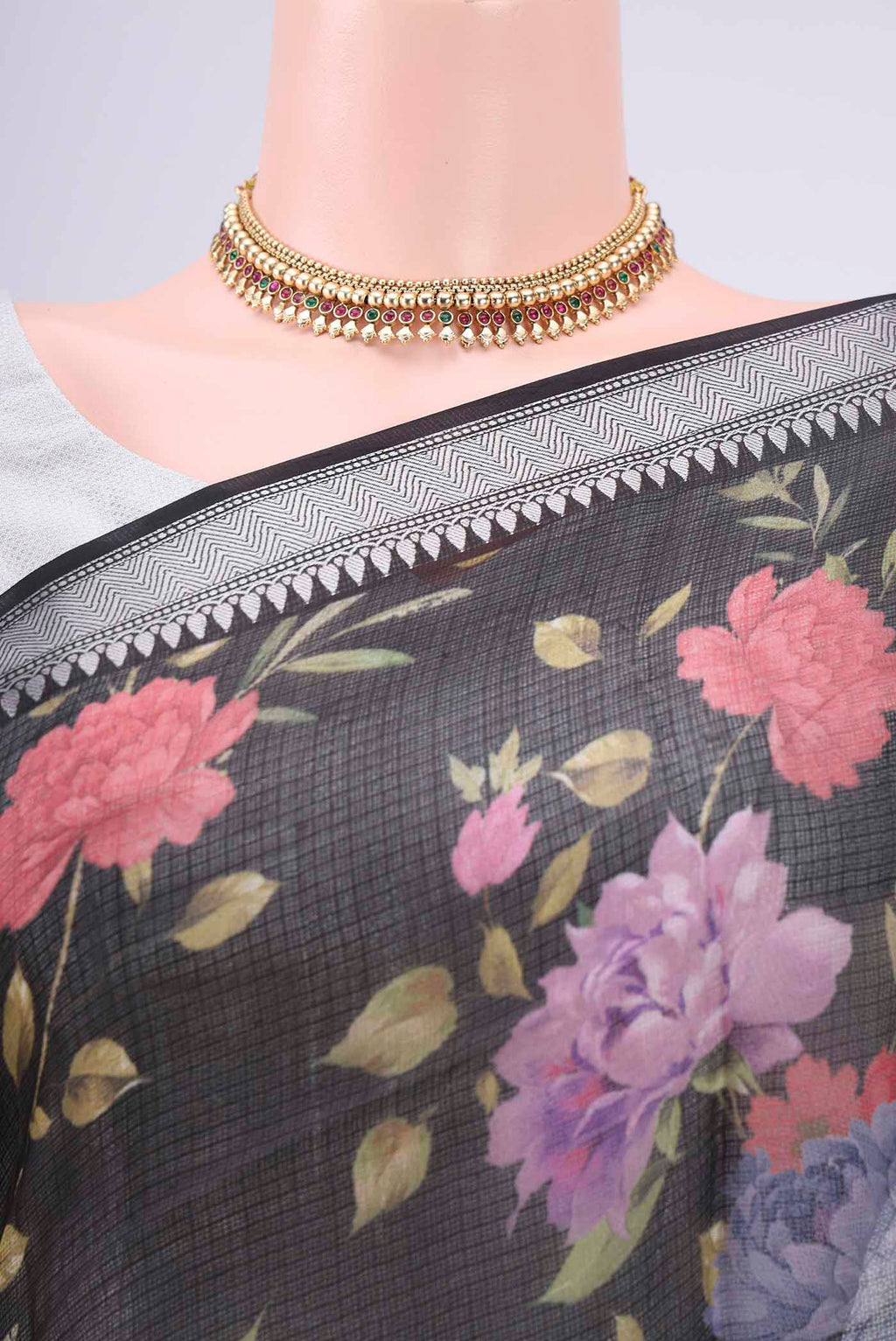 Border image of Black Kota Silk Saree with Floral Print on the body and Zari Border. 