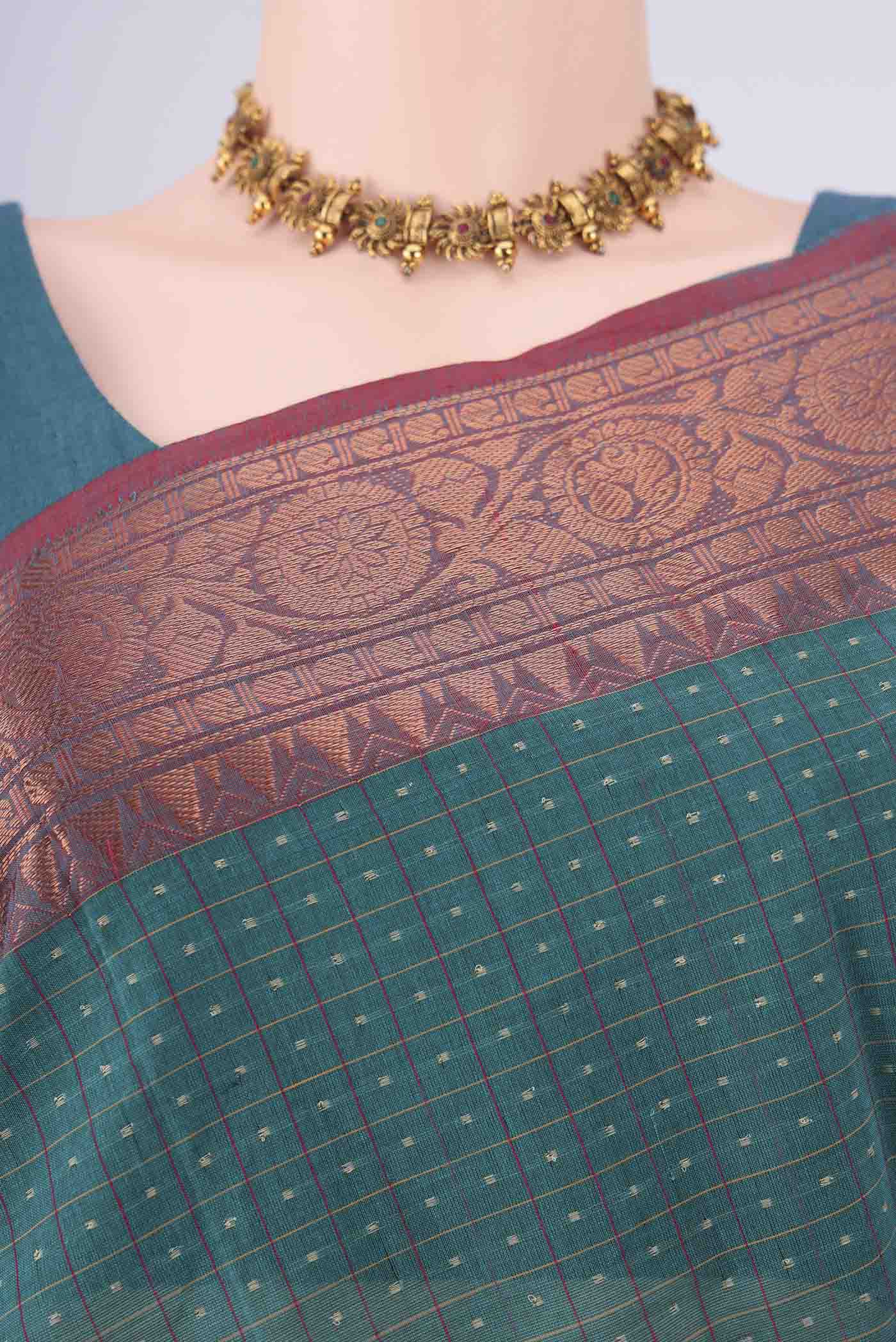 Border image of Green Kanchi Cotton Saree with Checked design on the body and Zari Border. 