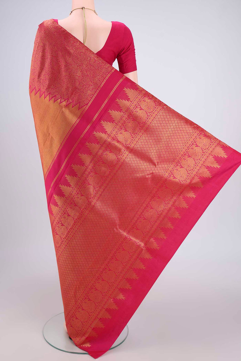 Flat view of Rani Pink Dual Tone Kanchipuram Silk Saree with Half And Half on the body and Temple Border. 