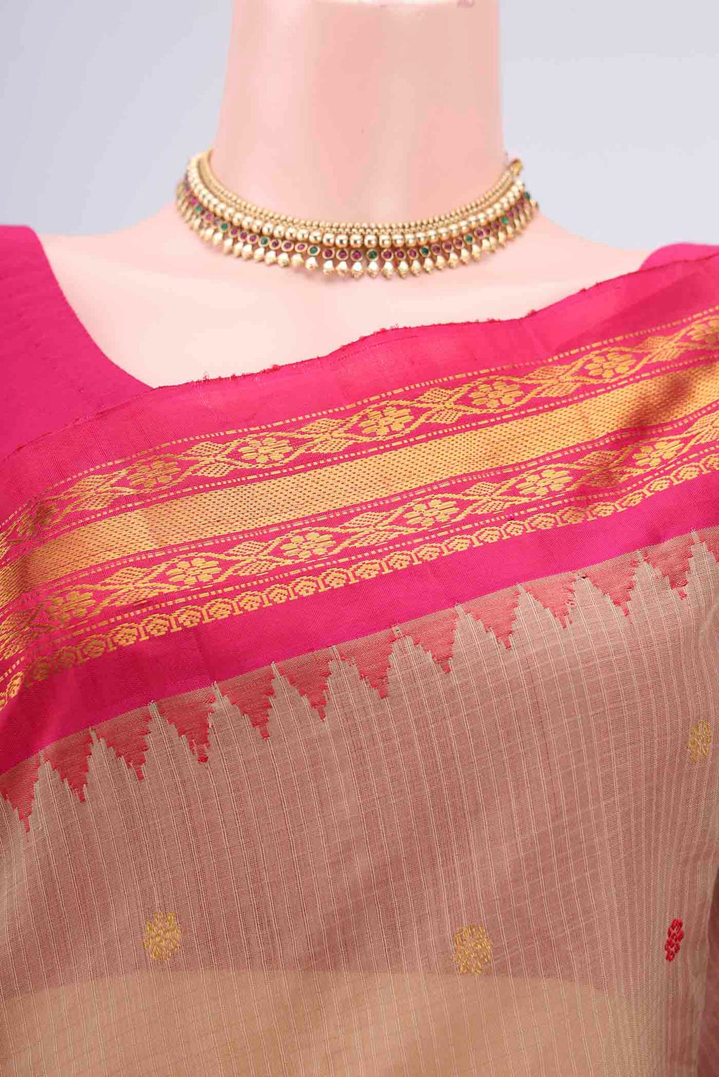 Border image of Beige Gadwal Silk Saree with Zari And Thread Butta on the body and Zari Border. 