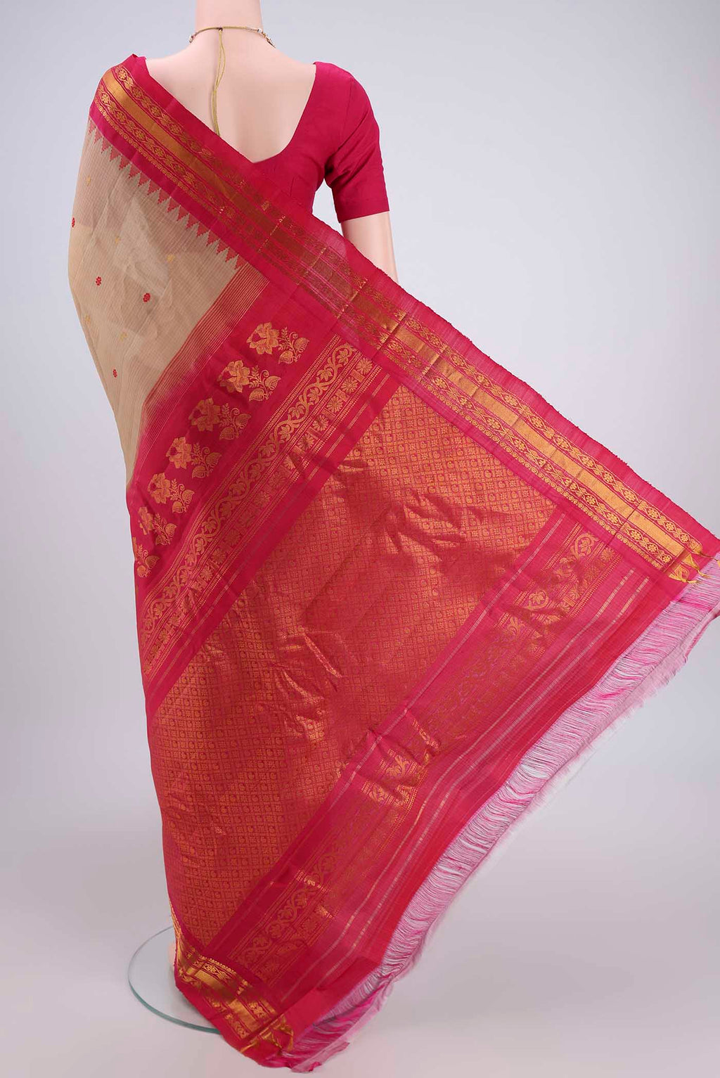 Flat view of Beige Gadwal Silk Saree with Zari And Thread Butta on the body and Zari Border. 