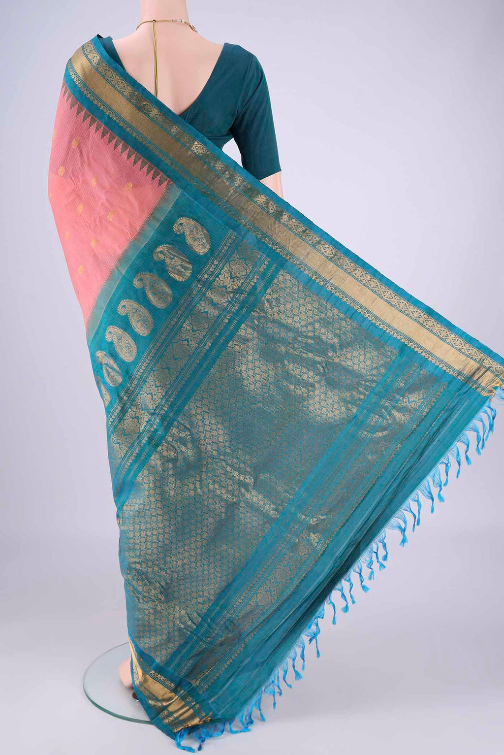 Flat view of Coral Gadwal Silk Cotton Saree with Zari Butta on the body and Silk Border. 