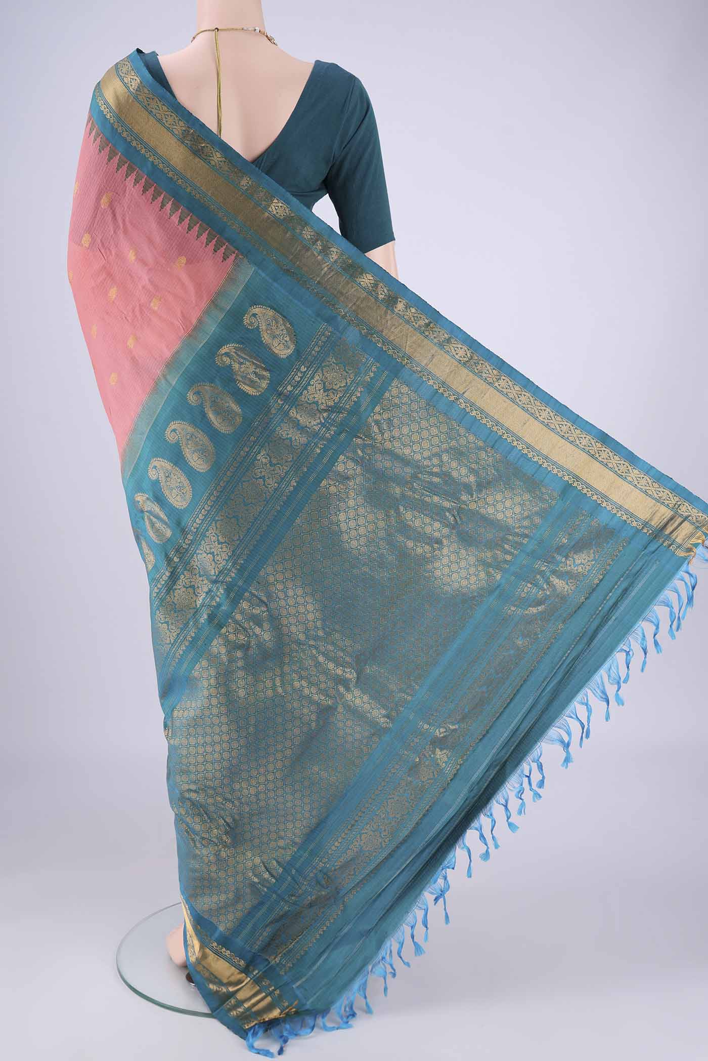 Flat view of Coral Gadwal Silk Cotton Saree with Zari Butta on the body and Silk Border. 