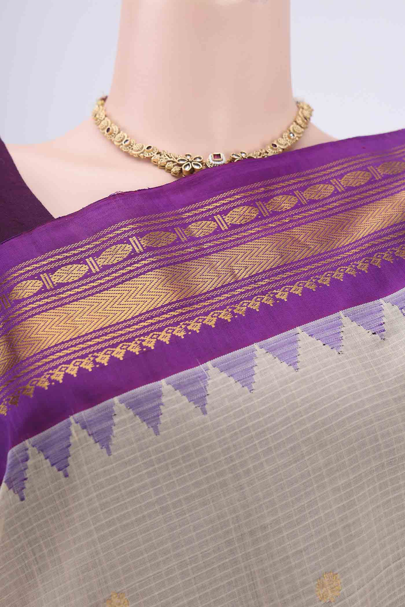 Border image of Beige Gadwal Silk Saree with Zari Butta on the body and Zari Border. 