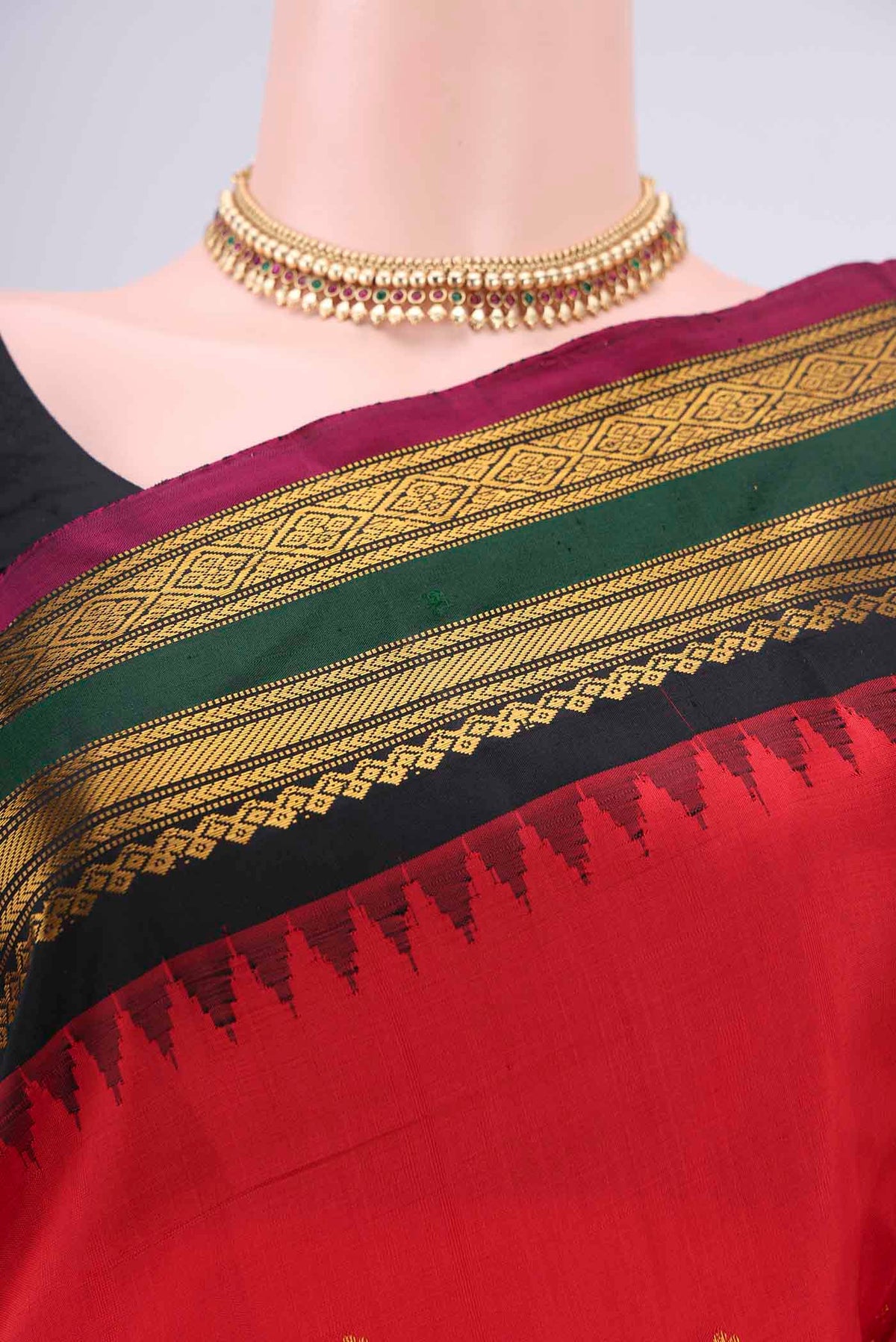 Border image of Red Gadwal Silk Saree with Zari Butta on the body and Zari Border. 