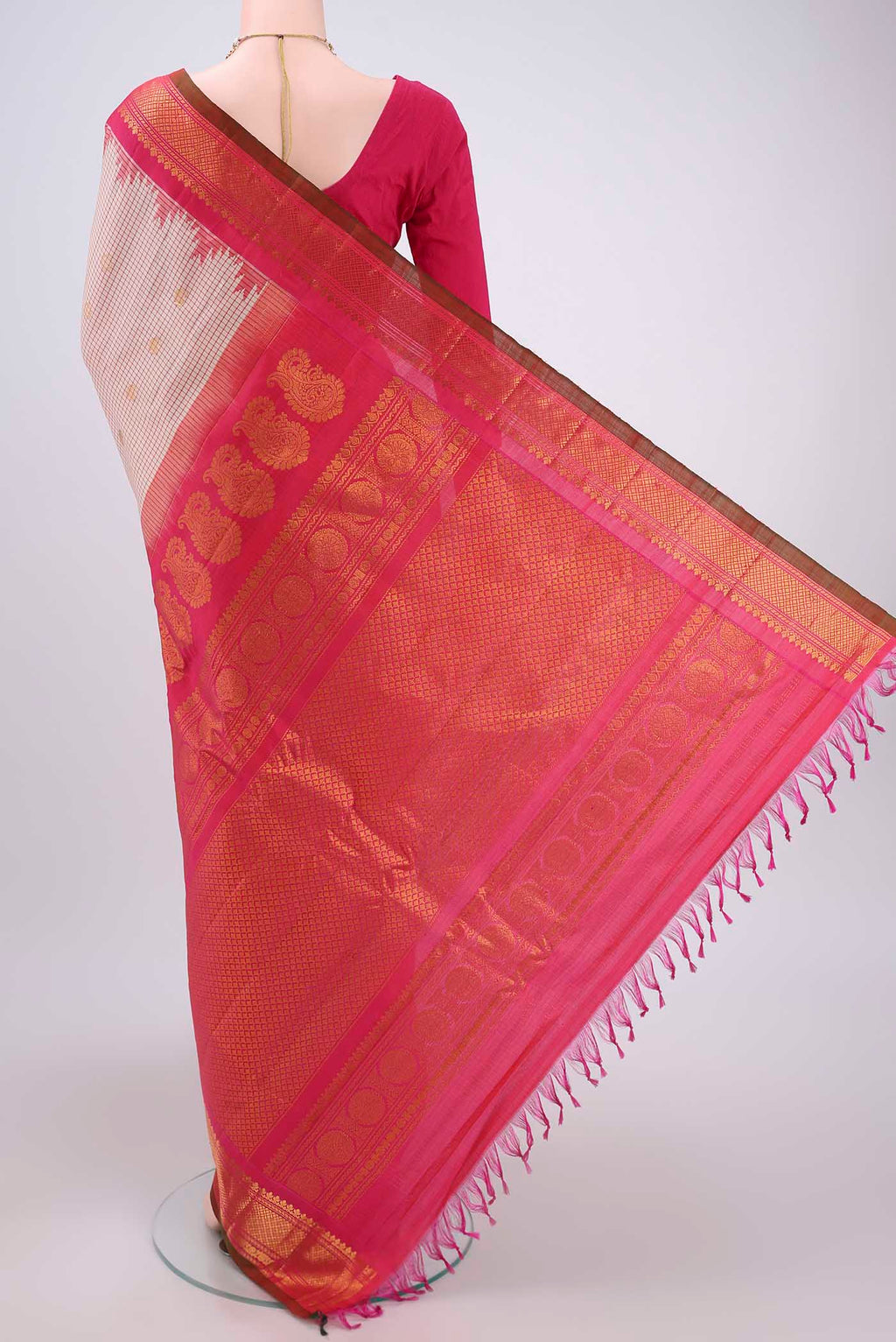 Flat view of Off White Gadwal Silk Saree with Checked design on the body and Zari Border. 