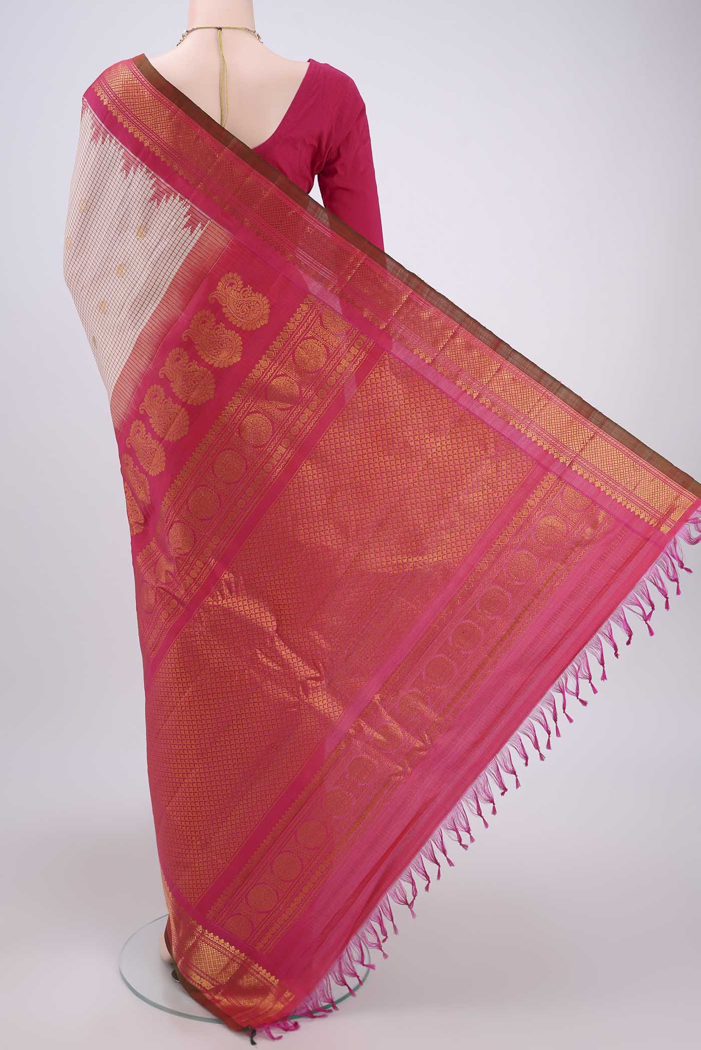Flat view of Off White Gadwal Silk Saree with Checked design on the body and Zari Border. 