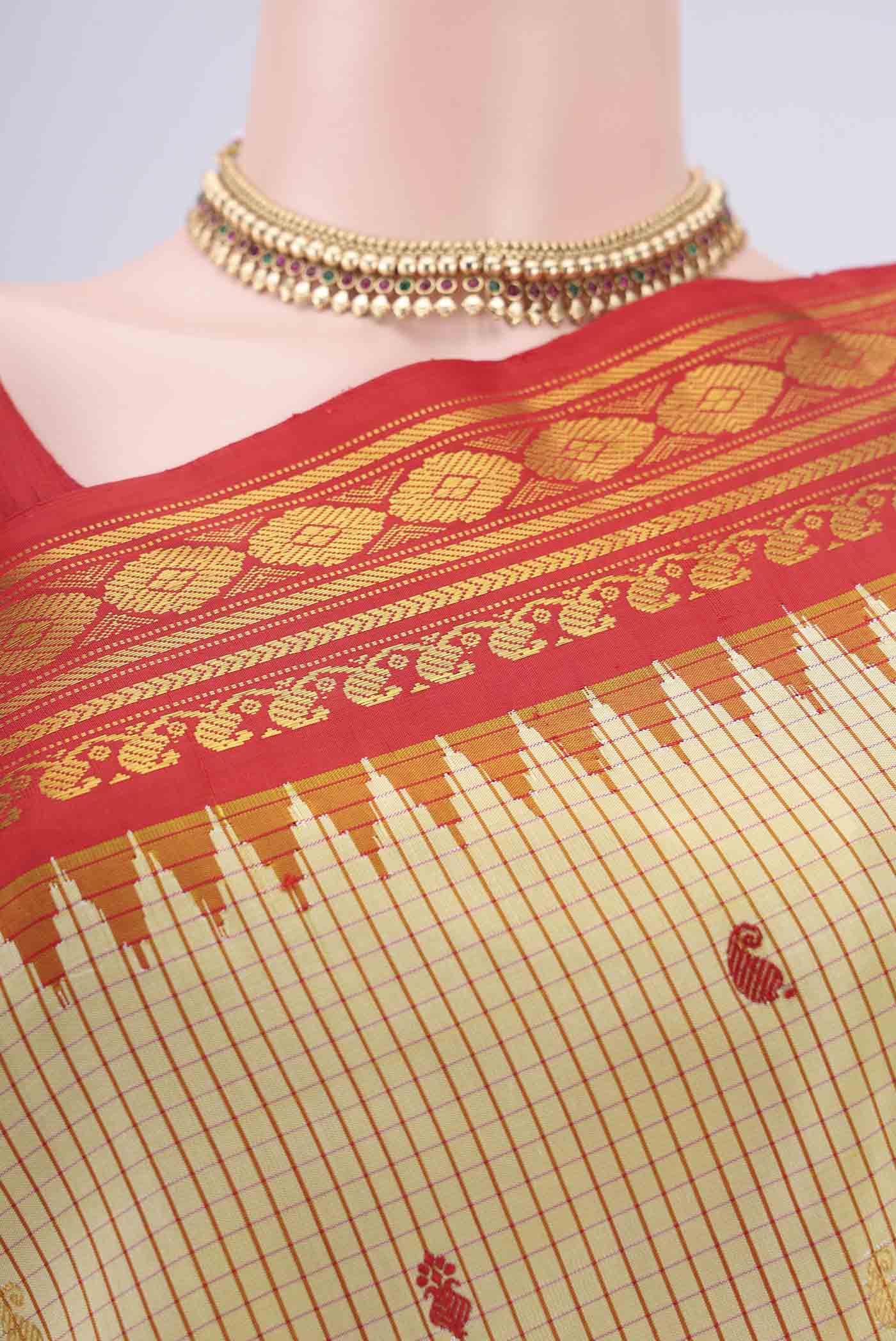 Border image of Acid Green Dual Tone Gadwal Silk Saree with Checked design on the body and Temple Border. 