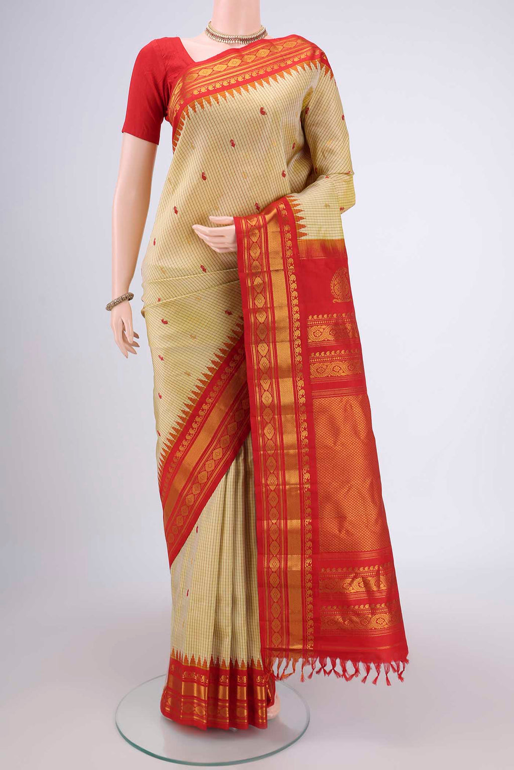 Acid Green Dual Tone Gadwal Silk Saree with Checked design on the body and Temple Border.  displayed on a mannequin